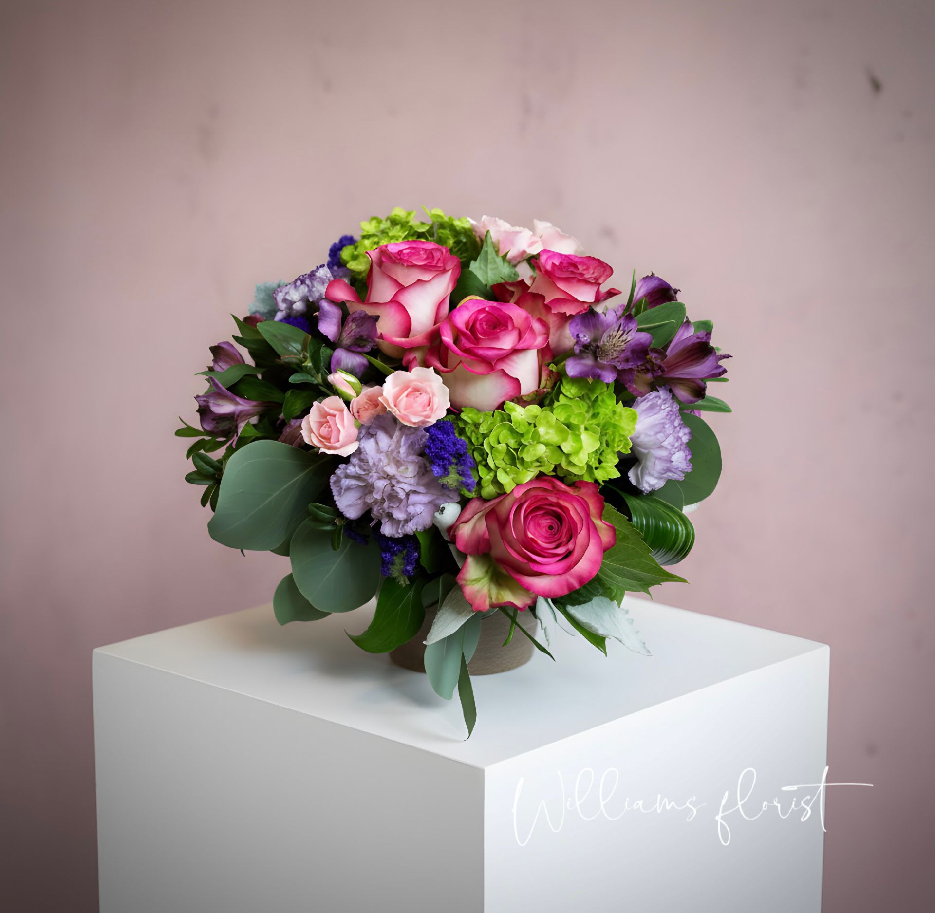 Delightful Joy - This exclusive bouquet features a gathering of blooms in bright, cheerful colors, creating the perfect complement adding joy to their day and coziness to their décor.