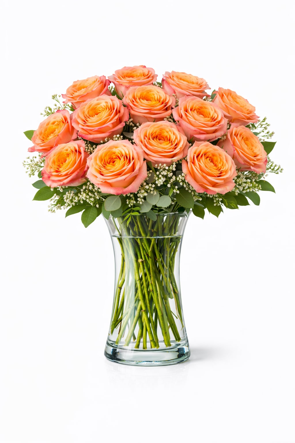 Bouquet of peach roses in a clear glass vase