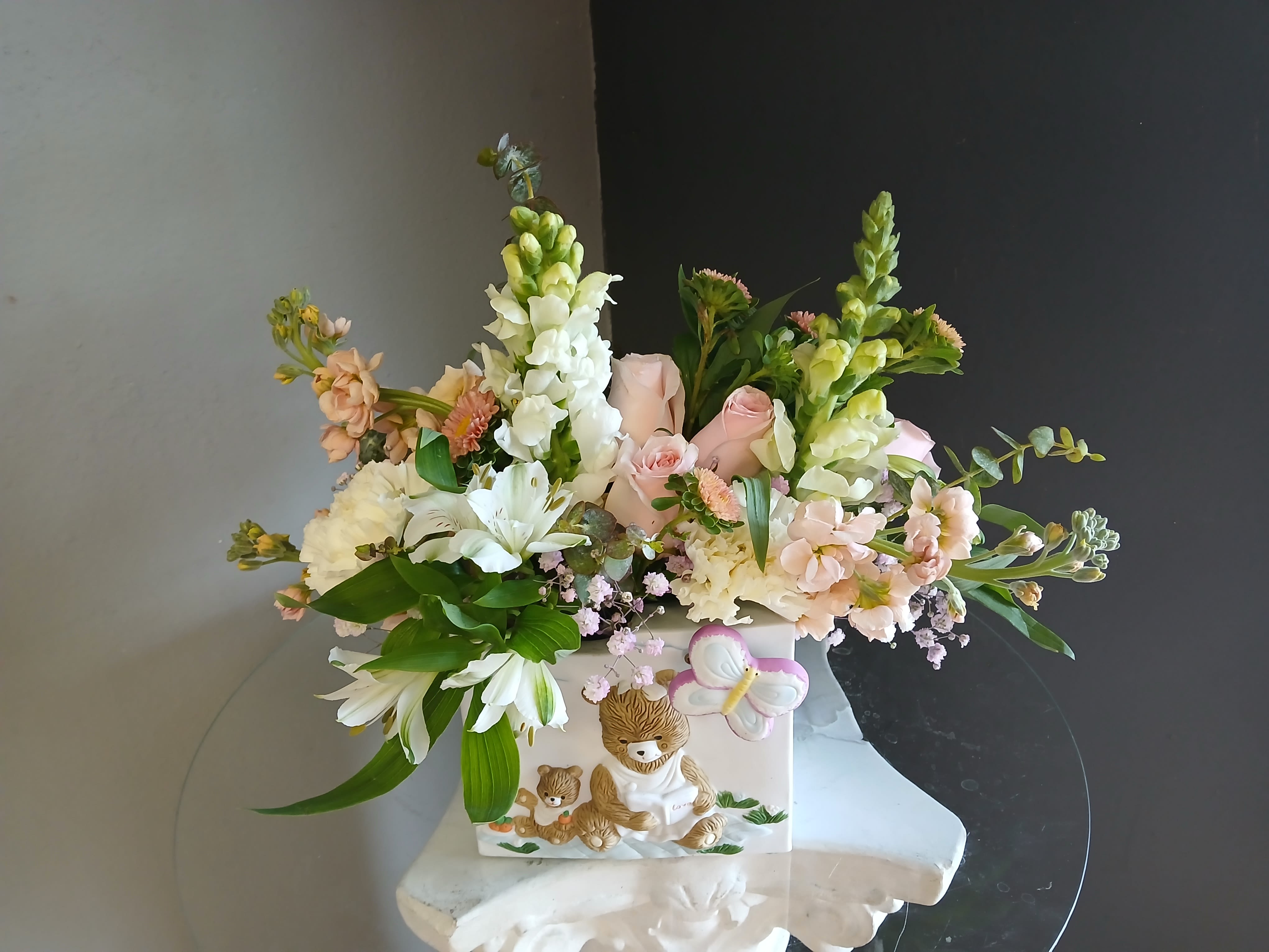 #708 Designer's Choice Vase Arrangement - This beautiful flower arrangement of fresh mixed seasonal blooms is made by local designers in the heart Orange California. Hand crafted and perfect for every occasion, from birthdays and new babies to sympathy and just because. The best choice to show you are thinking of that special someone. Can be sent as a local delivery or in-store pickup. This is an original, one of a kind arrangement. Order now before it's too late!  UPGRADES: All upgrades are applied at the designer’s discretion and fulfilled to value using the freshest seasonal and/or premium flowers available. Container upgrades may be included when possible; otherwise, value is reflected in the floral selection while maintaining the original design style. 