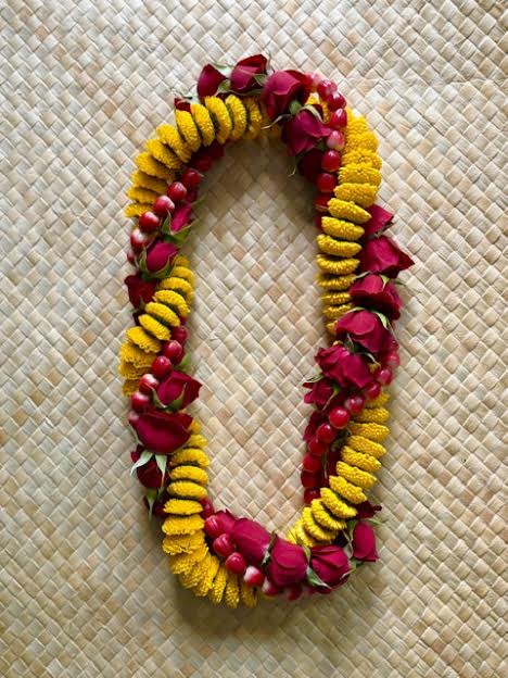 Red and Gold - This lei is a great lei to give to anyone who is being honored or celebrated. This lei is made from button mums, spray roses and hypericum. Colors can be customized as much as possible. PLEASE ORDER AT LEAST 2 DAYS IN ADVANCE. 