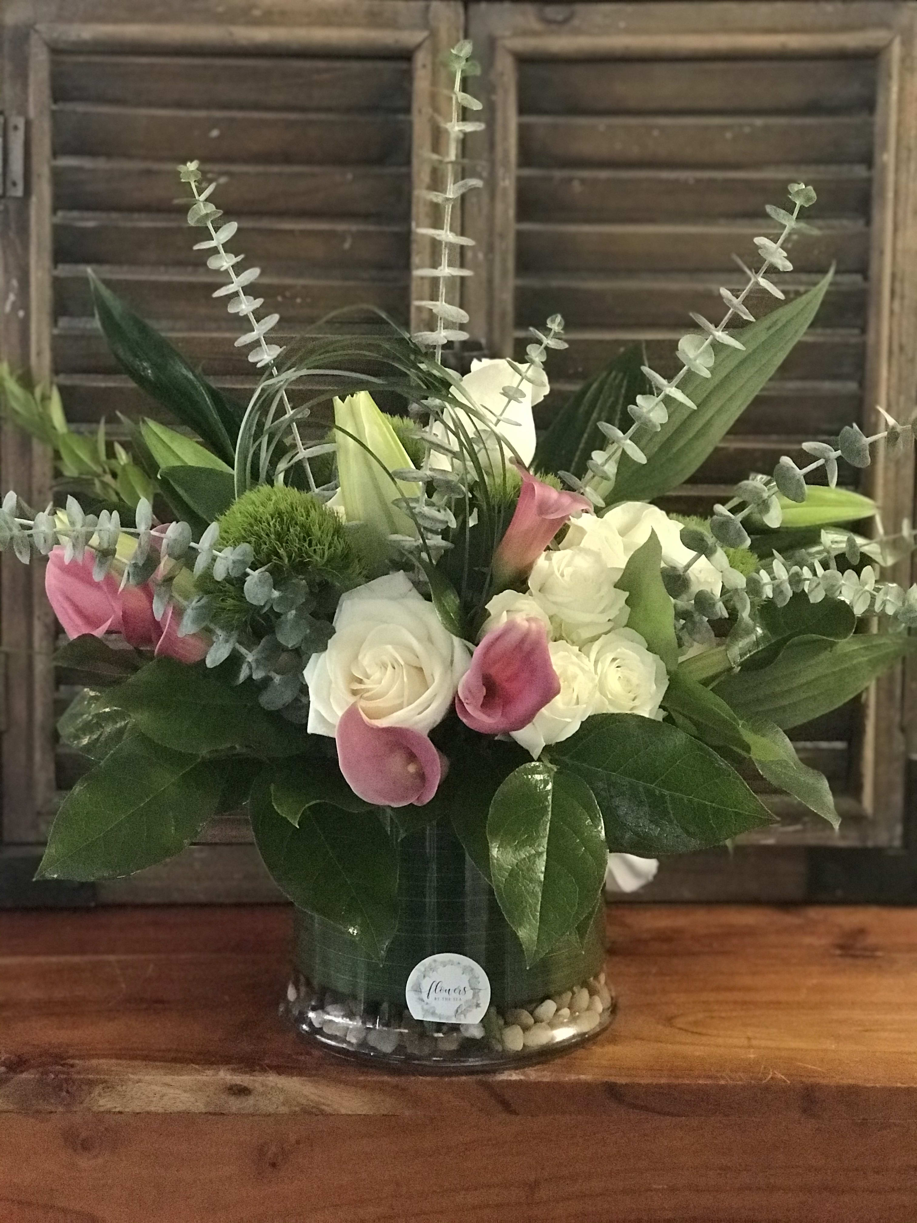 Casablanca Romance - The elegance of this arrangement touches that someone's heart with the casablanca lilies. 