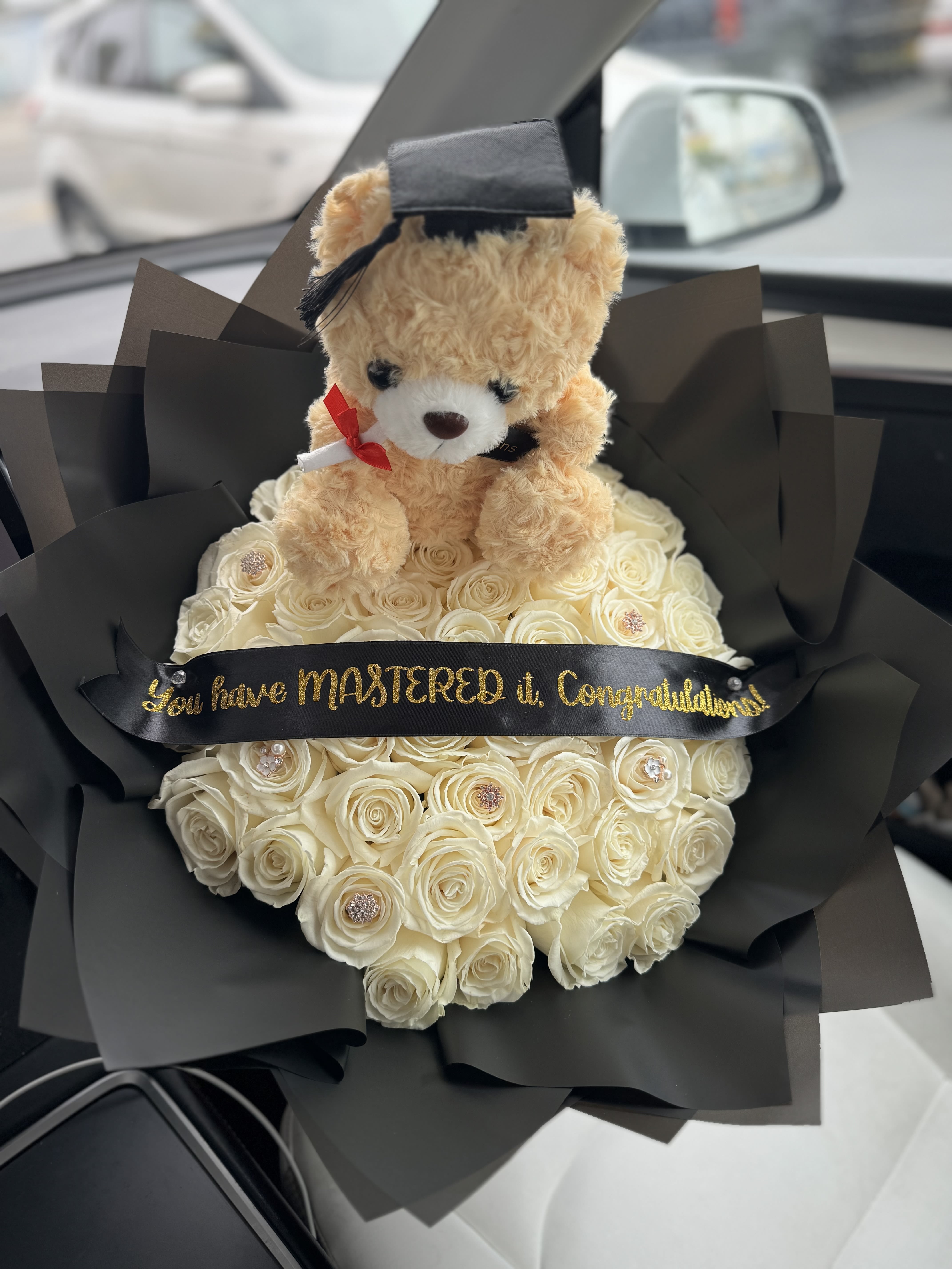 Congrats!  - 50 White Roses with Grad Theme