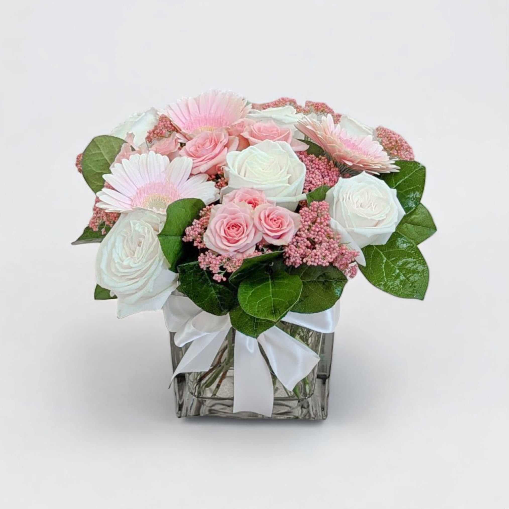 Ballerina's Tutu - This delicate arrangement features a lovely mix of soft pink and white flowers, perfectly capturing the beauty and grace of a ballerina’s dance dress. A wonderful gift for welcoming a new baby, celebrating a birthday, or simply brightening someone's day, this bouquet is a delightful choice for ballet lovers and anyone who appreciates exquisite floral designs.