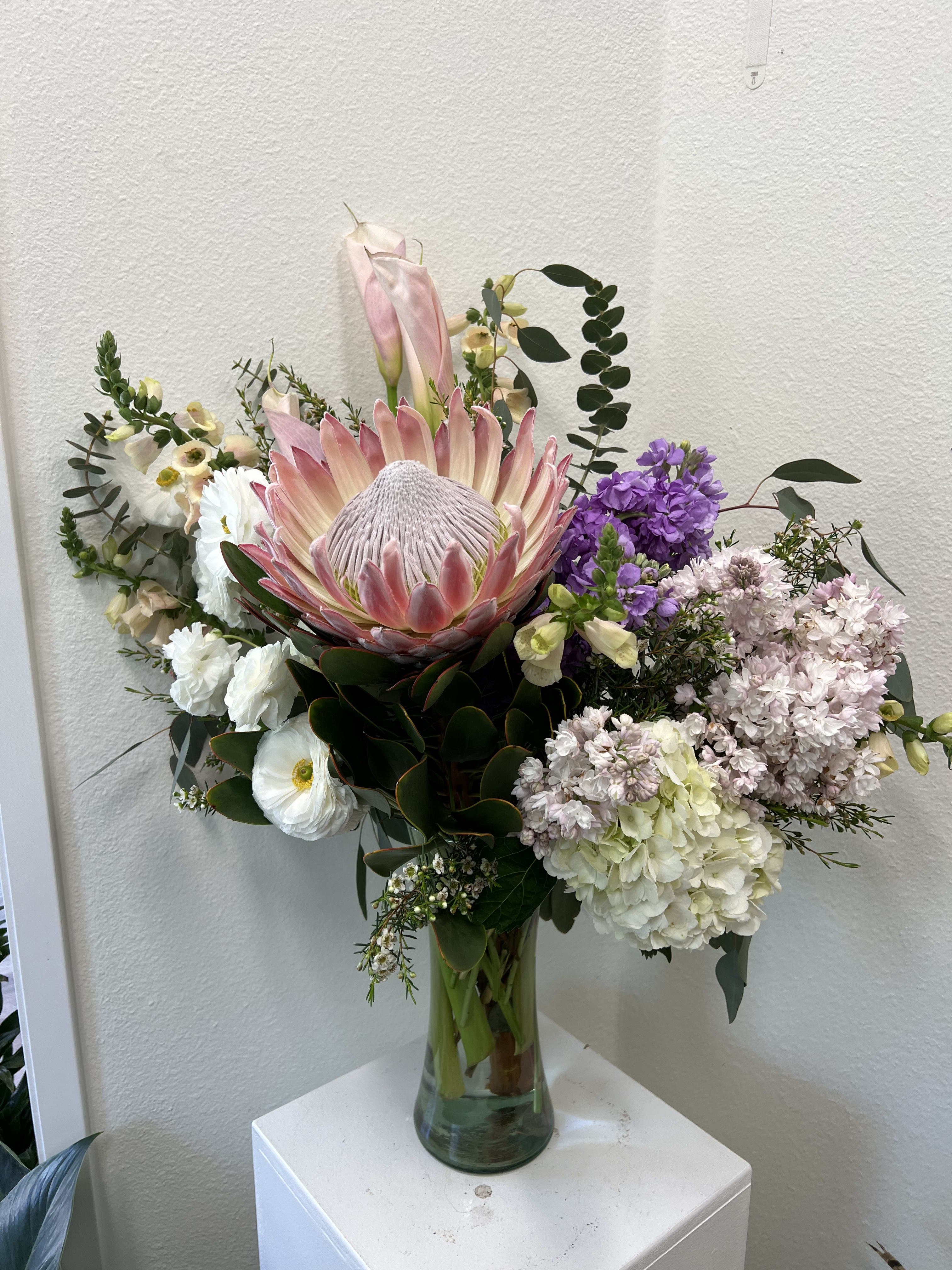 Queen everything - Fit for a Queen- king protea with other blooms.