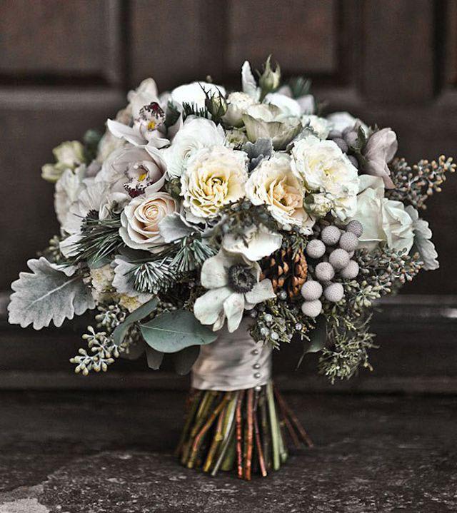 White and cream bridal bouquet with roses and orchids