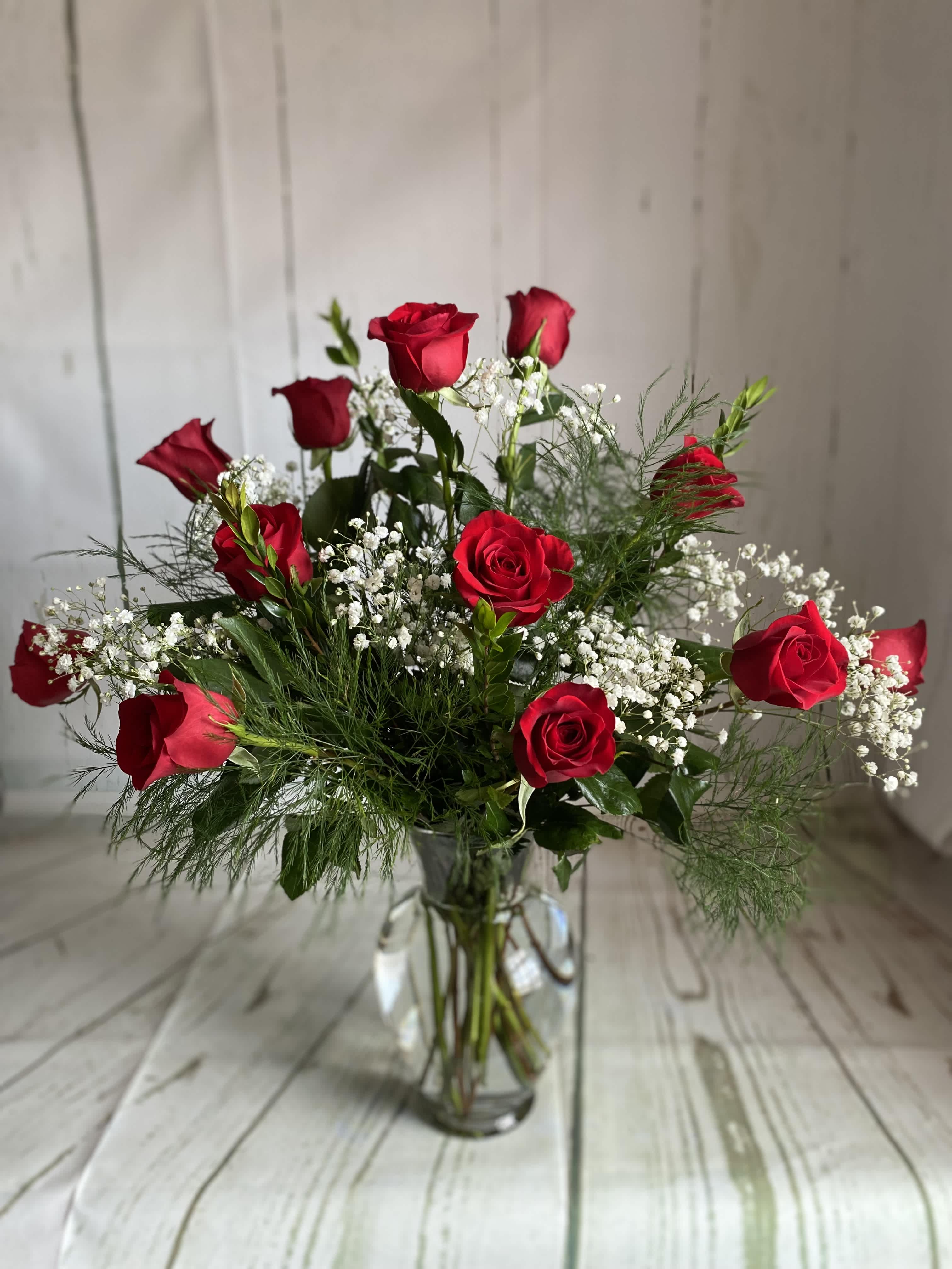 Dozen Roses - Michaleen's classic dozen.  *Please call us at 607-257-3203 to request a dozen in another color. We can accommodate most requests with at least 24 hours' notice &amp; always carry other colors in stock!