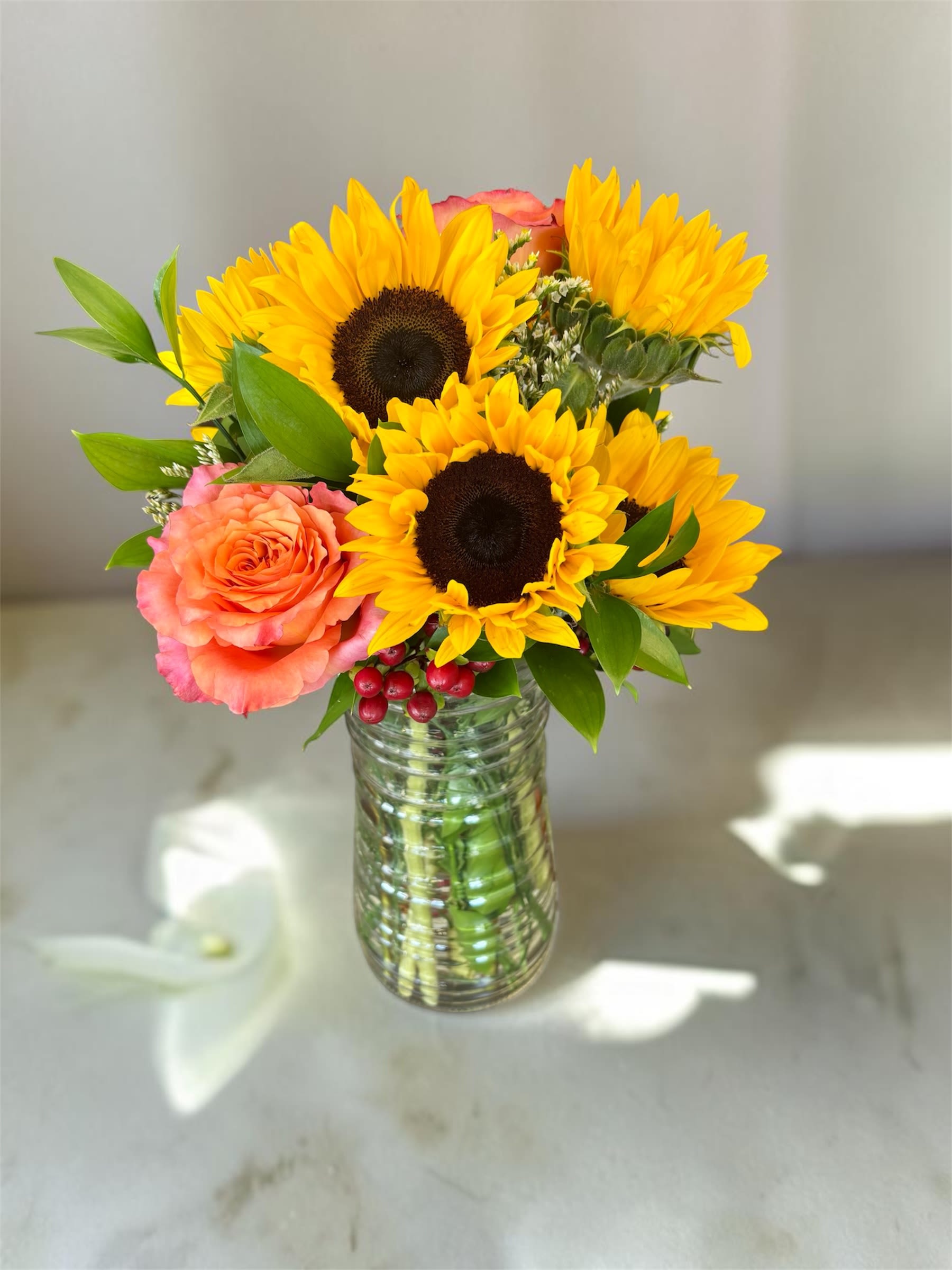 Golden Light funeral flower arrangement Hilliard Ohio