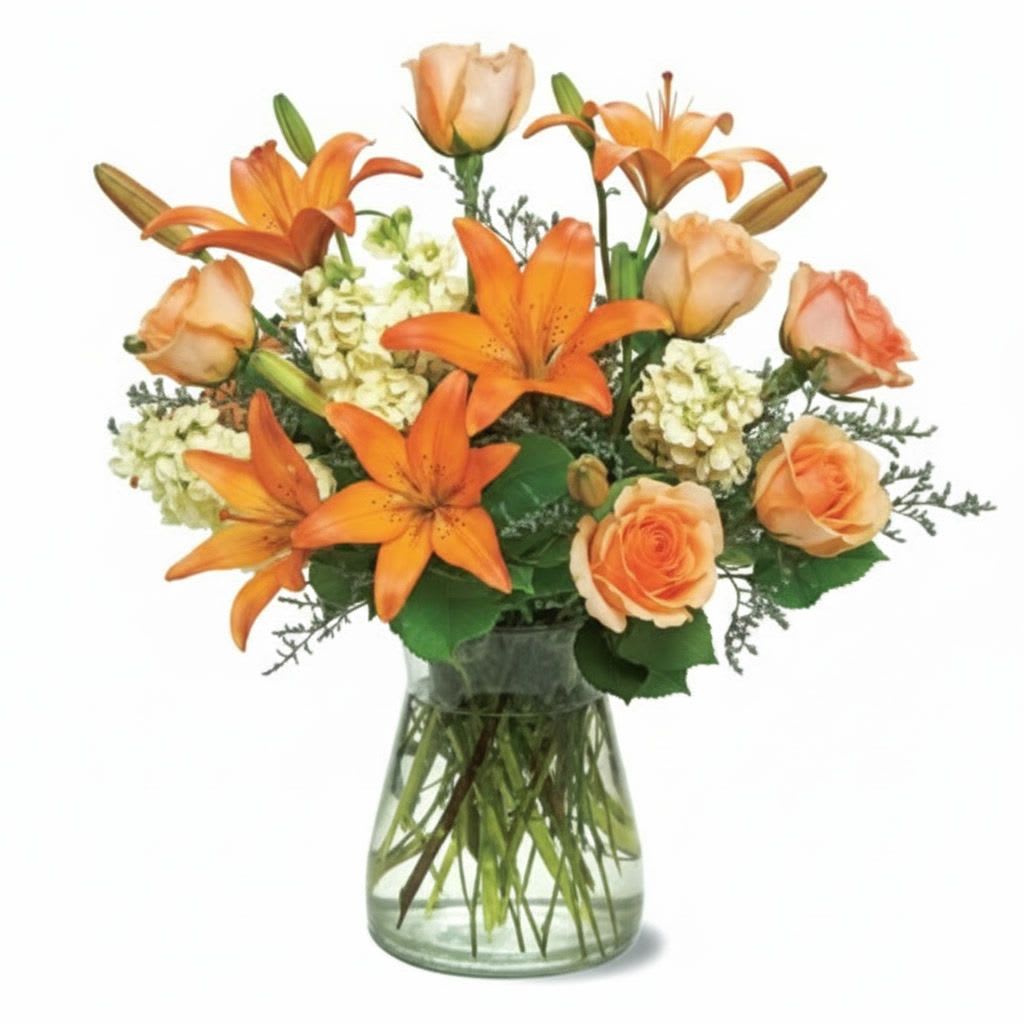 Peach Glow Flower -  Pet Friendly? No. Asiatic lilies are known to be toxic to cats and dogs if ingested.  Keep out of reach of curious pets and avoid homes with cats or small dogs.   Human Allergy Note : ️ Contains Asiatic lilies, which can be pollen-heavy.  Keep away from bedding and high-traffic breathing zones; ventilate the room when blooms are fresh.   Care &amp; Longevity : Trim stems at a 45° angle and place in clean water with fresh floral food. Change water every 1–2 days. Keep out of direct sun and heat sources. Remove fading blooms to prolong overall freshness.   Best Occasions &amp; Situations : - Birthday surprises - Congratulations &amp; milestones - Get-well encouragement - Thank-you gifts - Romantic gestures - Housewarming blossoms - Welcome new baby - Everyday cheer   Why Customers Love It : - Warm, radiant color palette that brightens any space - Balanced mix of roses, lilies, and hydrangeas for eye-catching depth - Clear glass vase makes it gift-ready and display-friendly - Versatile for many occasions - Fresh, hand-arranged quality