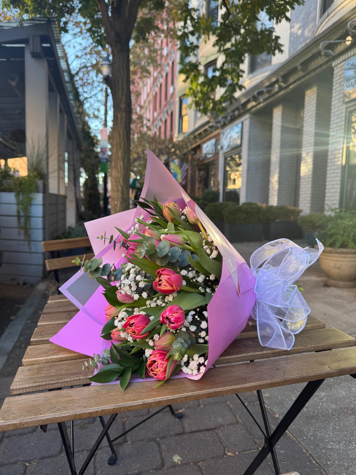 Tulips Bouquet. - Elevate any moment with the unmatched elegance of tulips. This bouquet brings together vibrant, handpicked tulips in a symphony of colors, blending soft pastels with bold hues for a statement of natural beauty. Whether it’s a gift or a touch of freshness for your home, this arrangement radiates sophistication and charm.