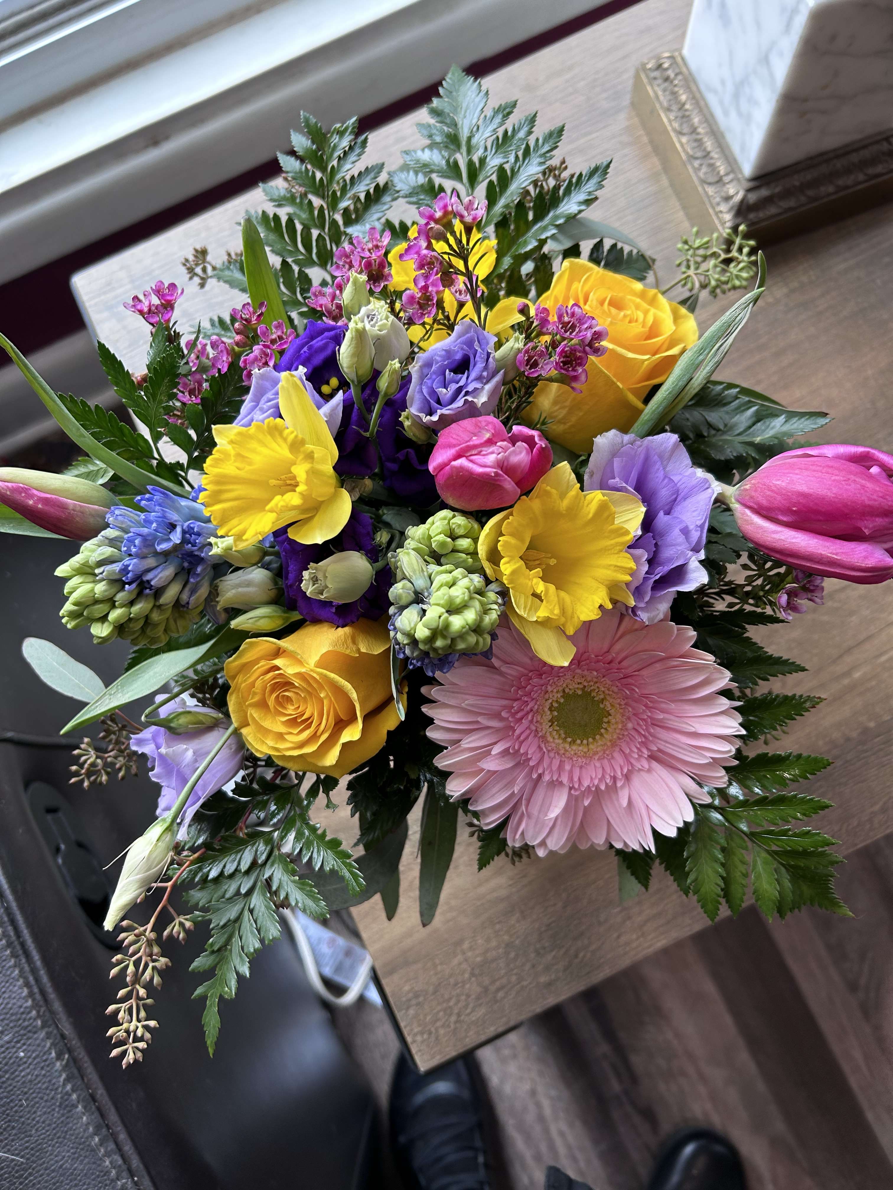 Hello Spring - Welcome Spring with this arrangement of tulips, hyacinths, daffodils and other Spring flowers.(Flowers may vary slightly depending on availability)