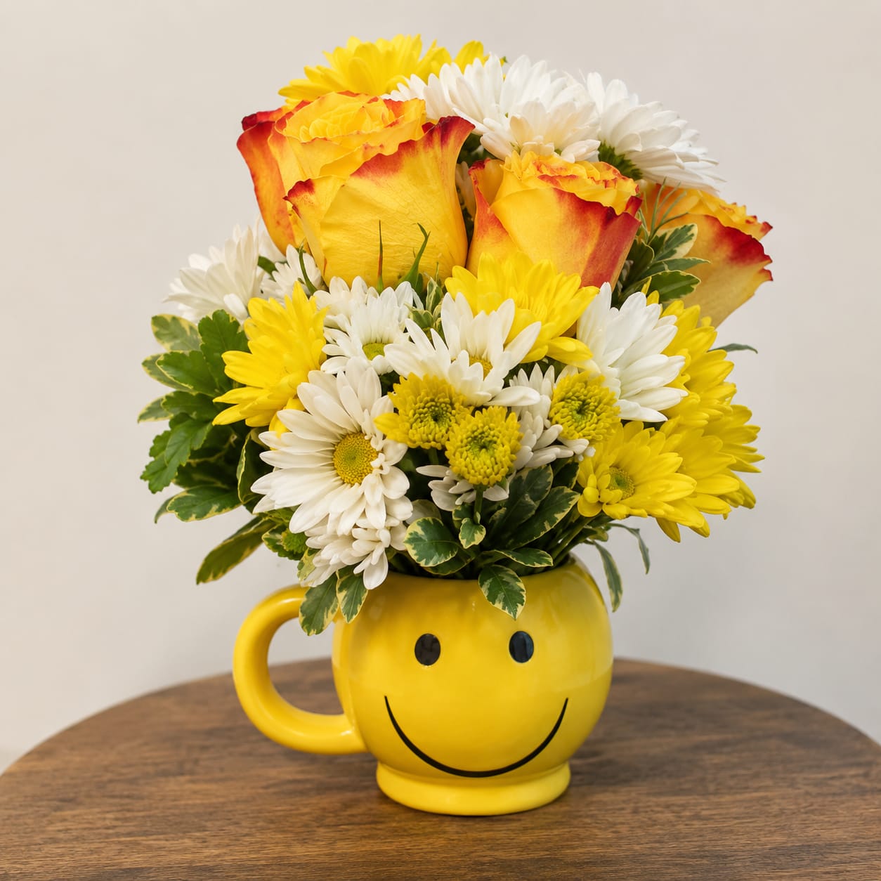 smiley face Flower -  Pet Friendly? No - Daisy chrysanthemums can be toxic to cats and dogs.  Keep out of reach and avoid placement in homes with curious household pets.   Human Allergy Note : Daisy chrysanthemums can be pollen-heavy for some people. If sensitivity is a concern, place the arrangement in a well-ventilated area and away from bedding.   Care &amp; Longevity : Keep the container clean and water fresh. Add small amounts of water daily to keep stems hydrated. Place away from direct sun, heat, and vents. Remove fading blooms promptly to help the rest last longer.   Best Occasions &amp; Situations : - Birthday smiles - Get well wishes - Congratulations - Thinking of you - Welcome home moments - Desk or kitchen cheer   Why Customers Love It : - Instantly cheerful design - Compact and gift-ready - Bright, balanced color contrast - Easy to place on desks or tables - Feels thoughtful without being formal