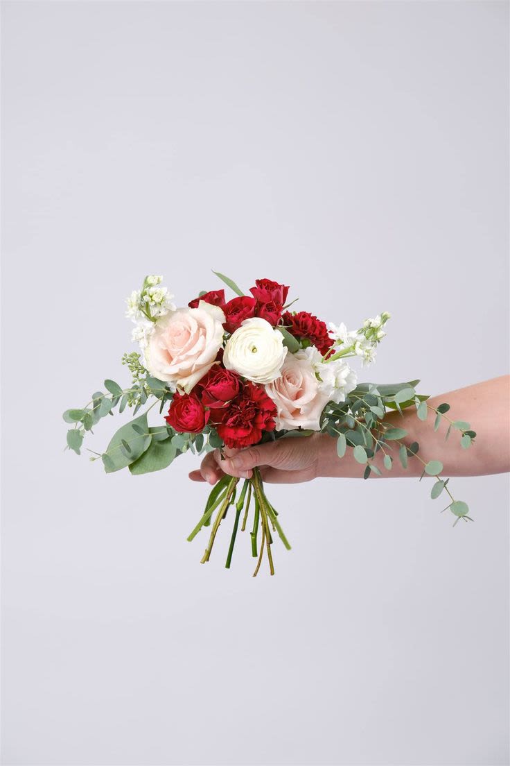 Petite Bouquet - Traditional, Elegant or Custom - If your date is looking for something different, gift them this petite bouquet for your Prom!  Can match with any dress color and style.  Please specify colors and styles when ordering!  Comes with roses, carnations, and more!  Pictures show size and typical flowers, not specific designs.