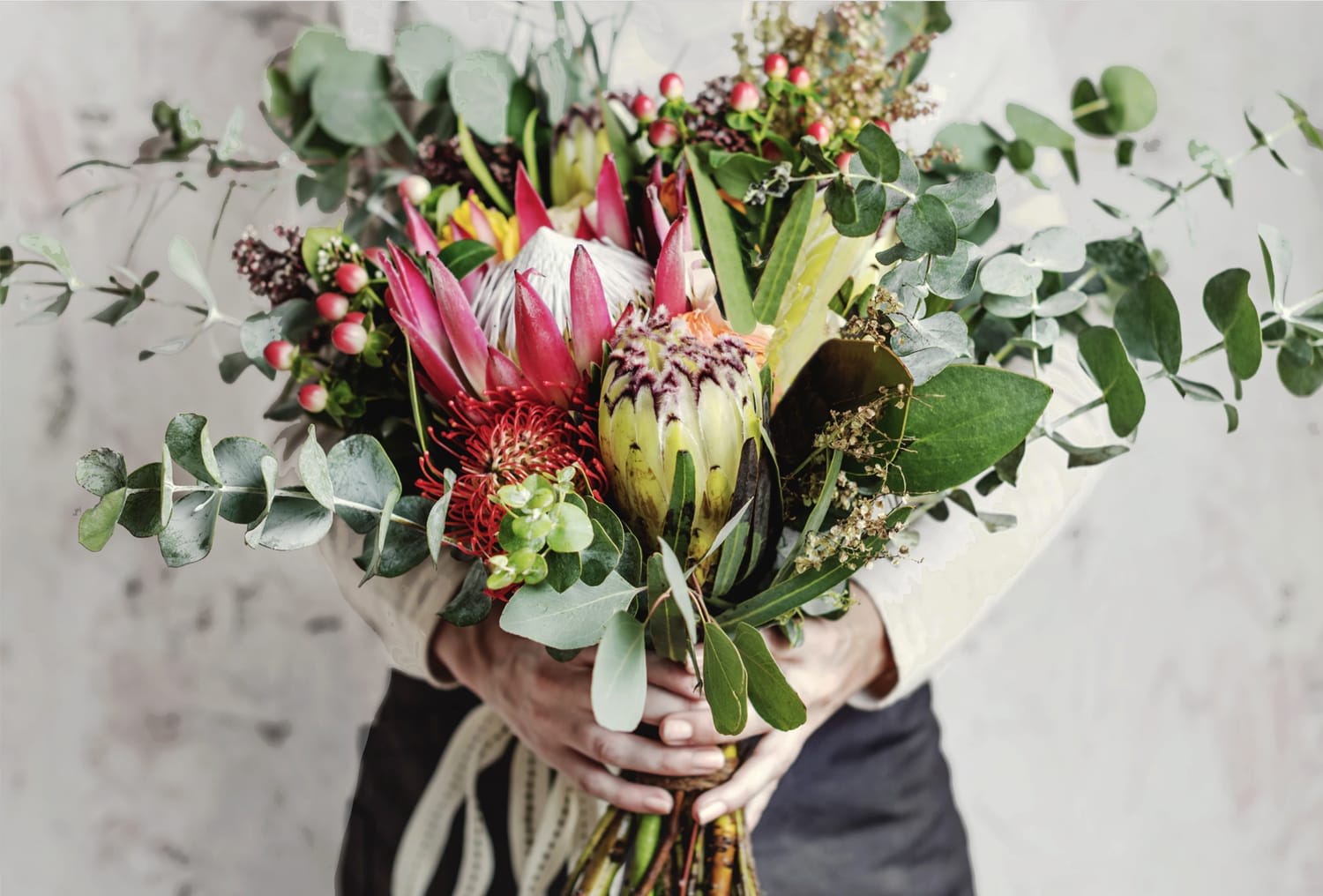 Luxurious mixed Protea bouquet - Luxurious mixed Protea bouquet These exquisite long lasting bouquets are designed for a powerful impact with locally sourced blooms mixed exotic greens eucalyptus and a plethora of the finest Protea blooms in the world