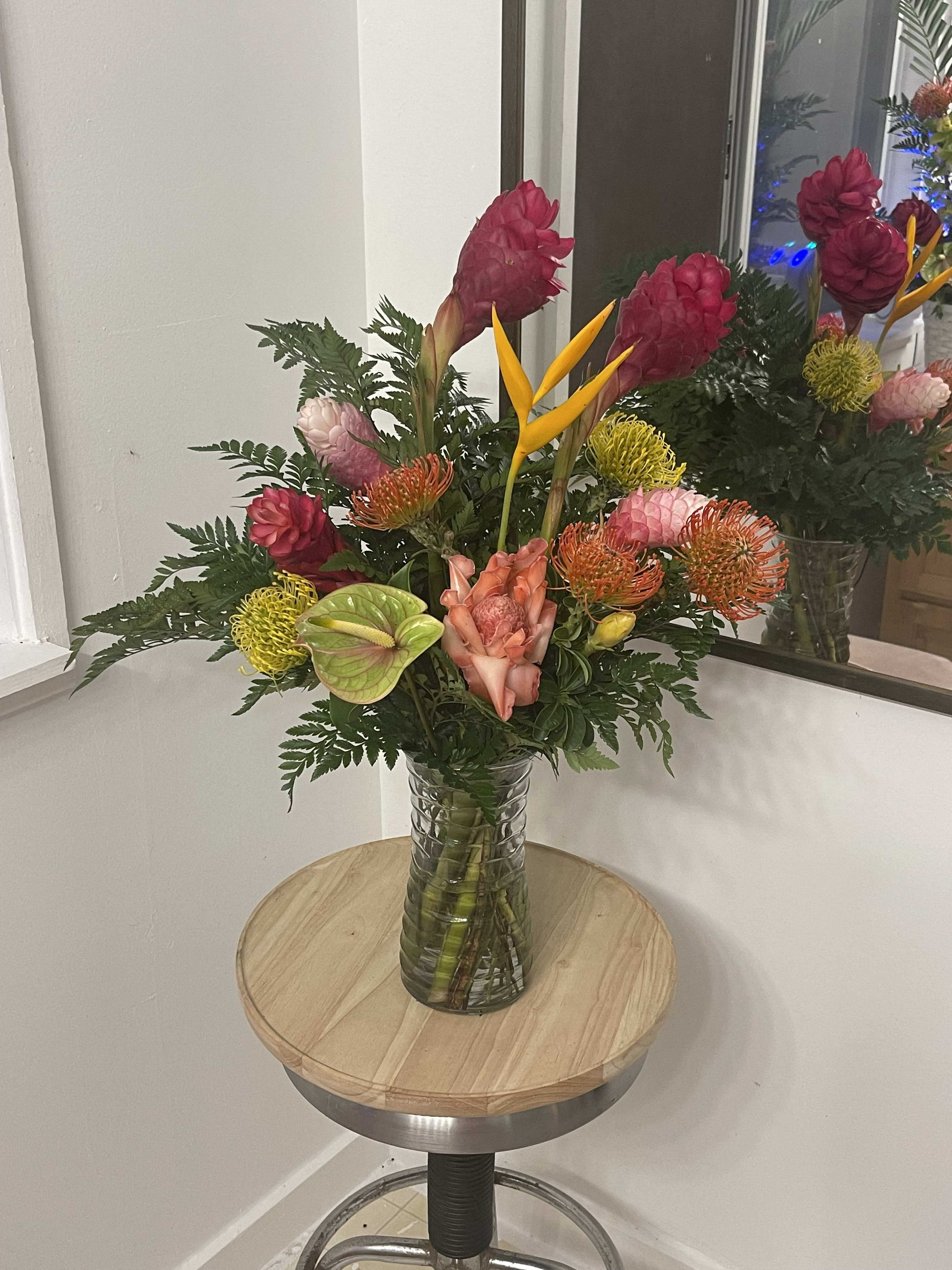 Tropical arrangement in a vase - Exotic selection of Tropical Florals in a vase  this floral arrangement includes seasonal tropical flowers 