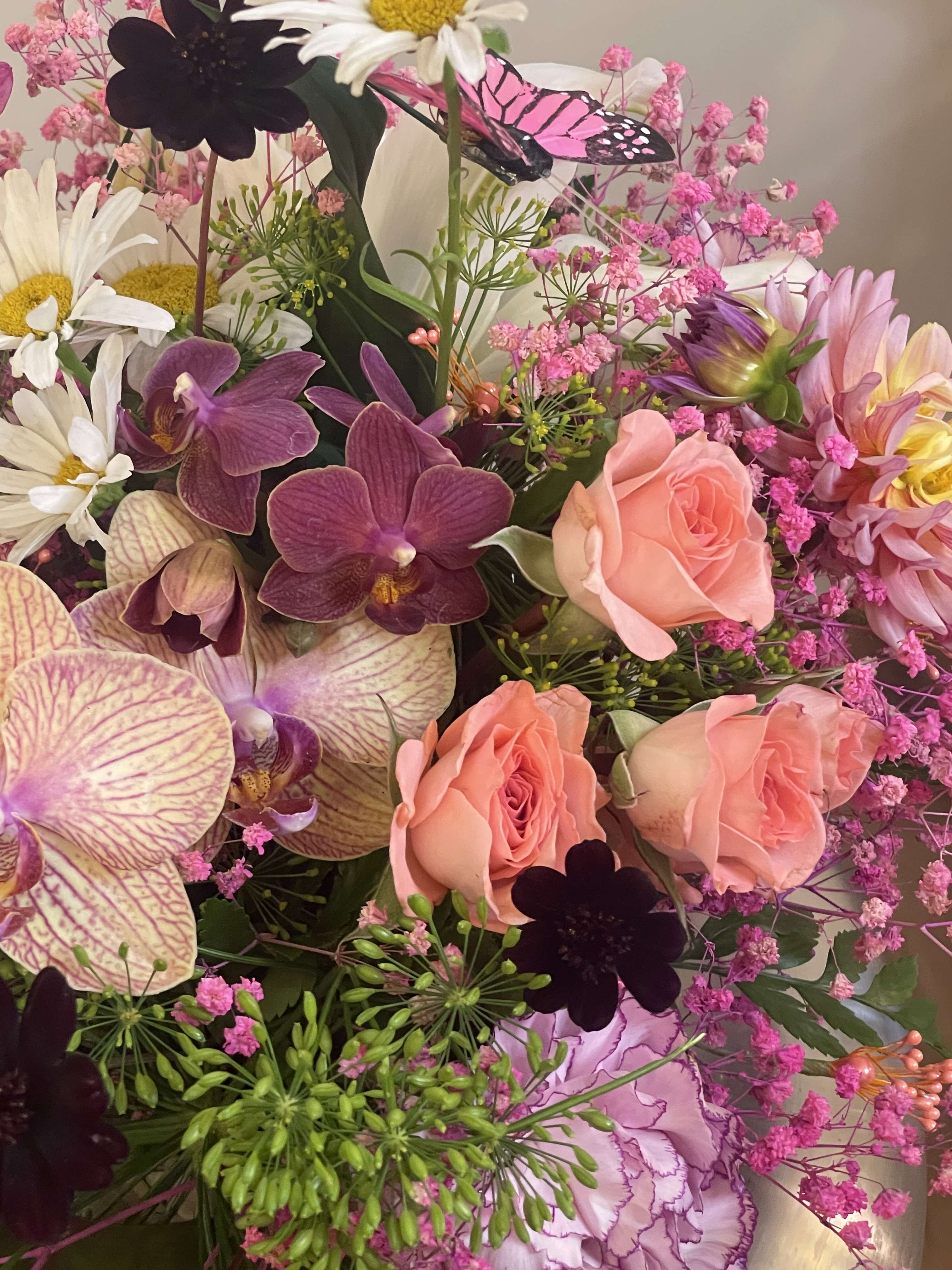 Low and compact mix, tropical flowers, &amp; cottage blooms  - This mixed floral arrangement is perfect for any dining room table  mixed tropical flowers and mainland blooms gives a unique arrangement for your home 