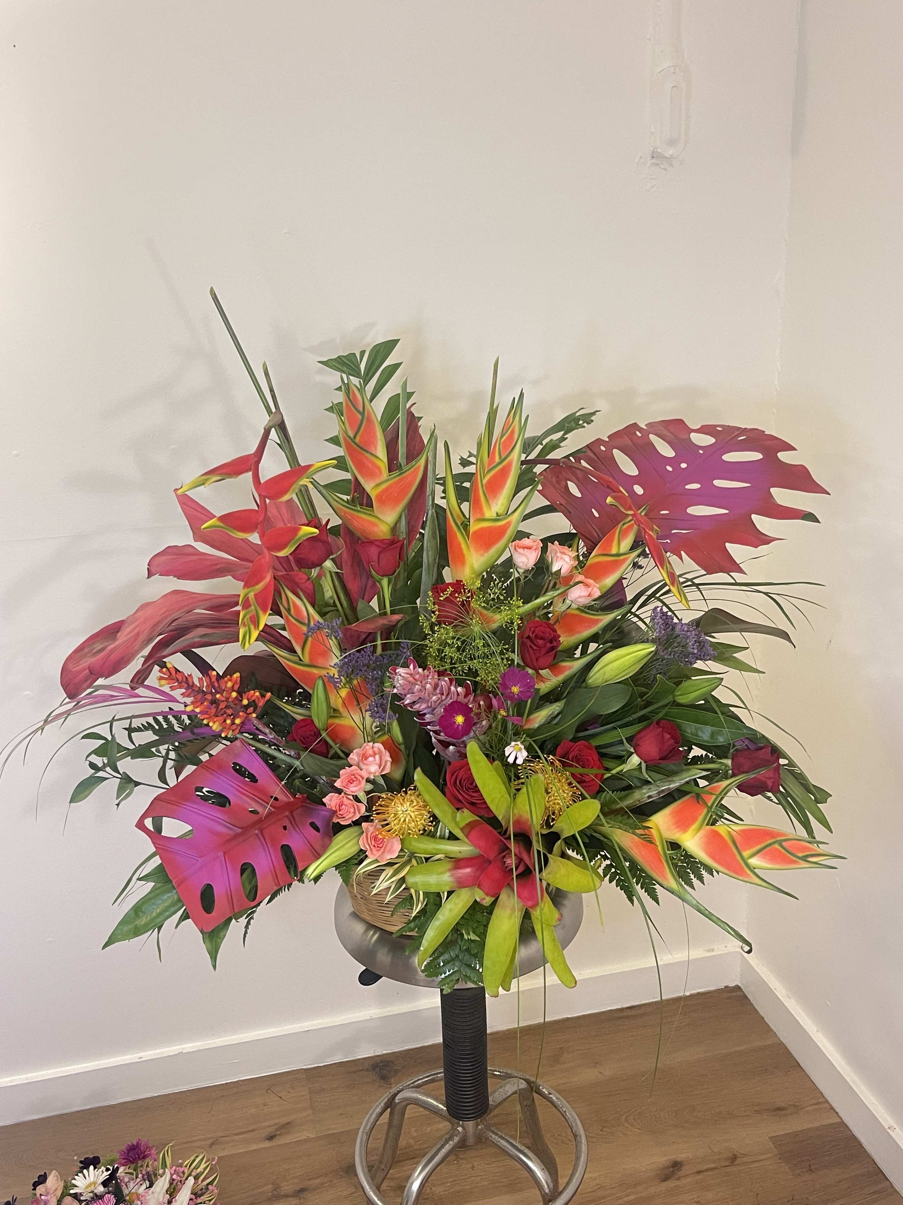 A large Grand display  of  tropical blooms &amp; cottage flowers  - This exotic display of tropical blooms will blow your loved ones away and shower them with love and aloha. 