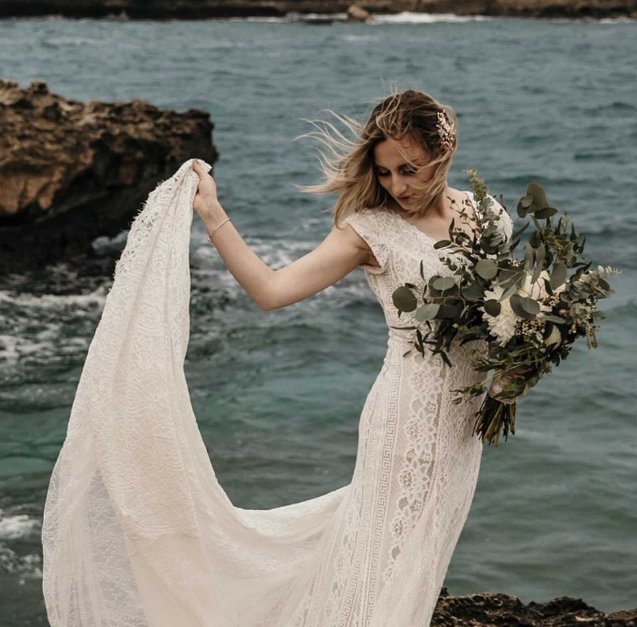 The ultimate I love flowers  mix  - This wedding floral package includes florals down the aisle, a full flower, Archway, and wedding bouquet and bouquets for all of the bridesmaids