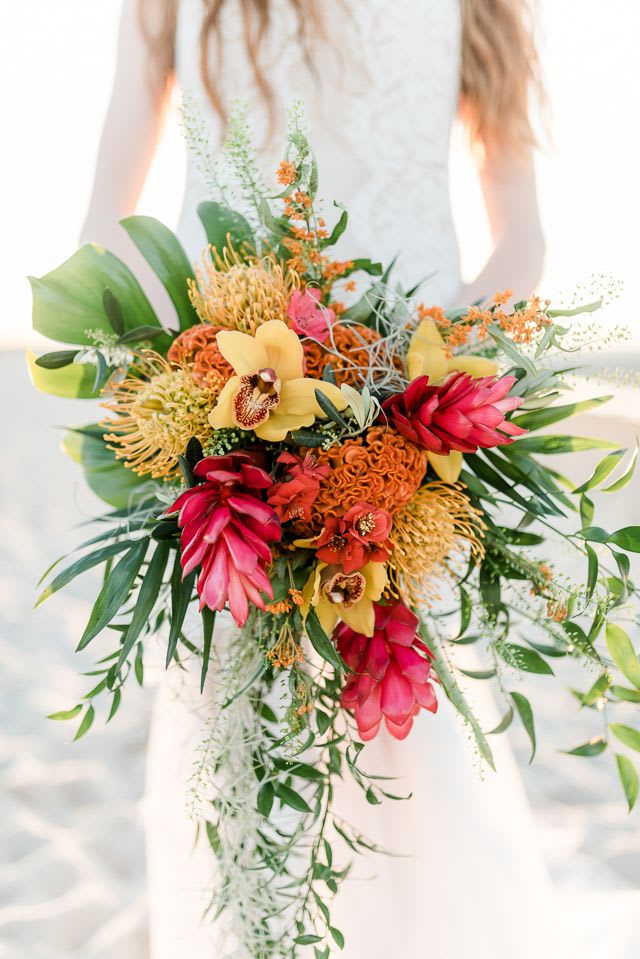 Tropical wedding memories bouquet with haku  Package - Tropical wedding memories bouquet this arrangement  with haku The bridal bouquet  is made with aloha and A whole lot of ️ love  we And make these one of a kind absolutely stunning wedding bouquets for your special day we use the highest quality of blooms available here in the Hawaiian islands