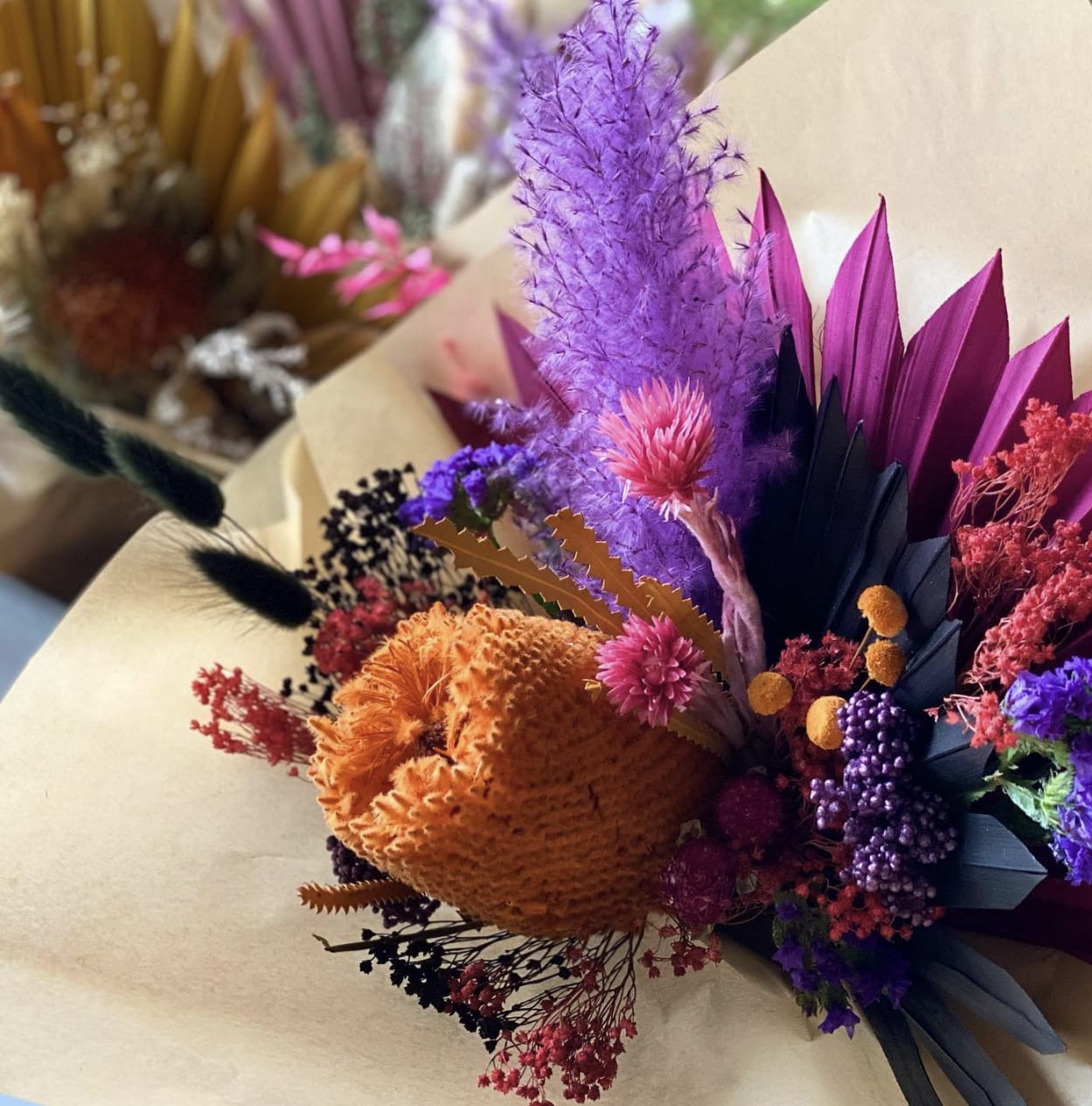 Three preserved floral  Bouquets bouquets  - A colorful display of three #3 preserved floral bouquets 
