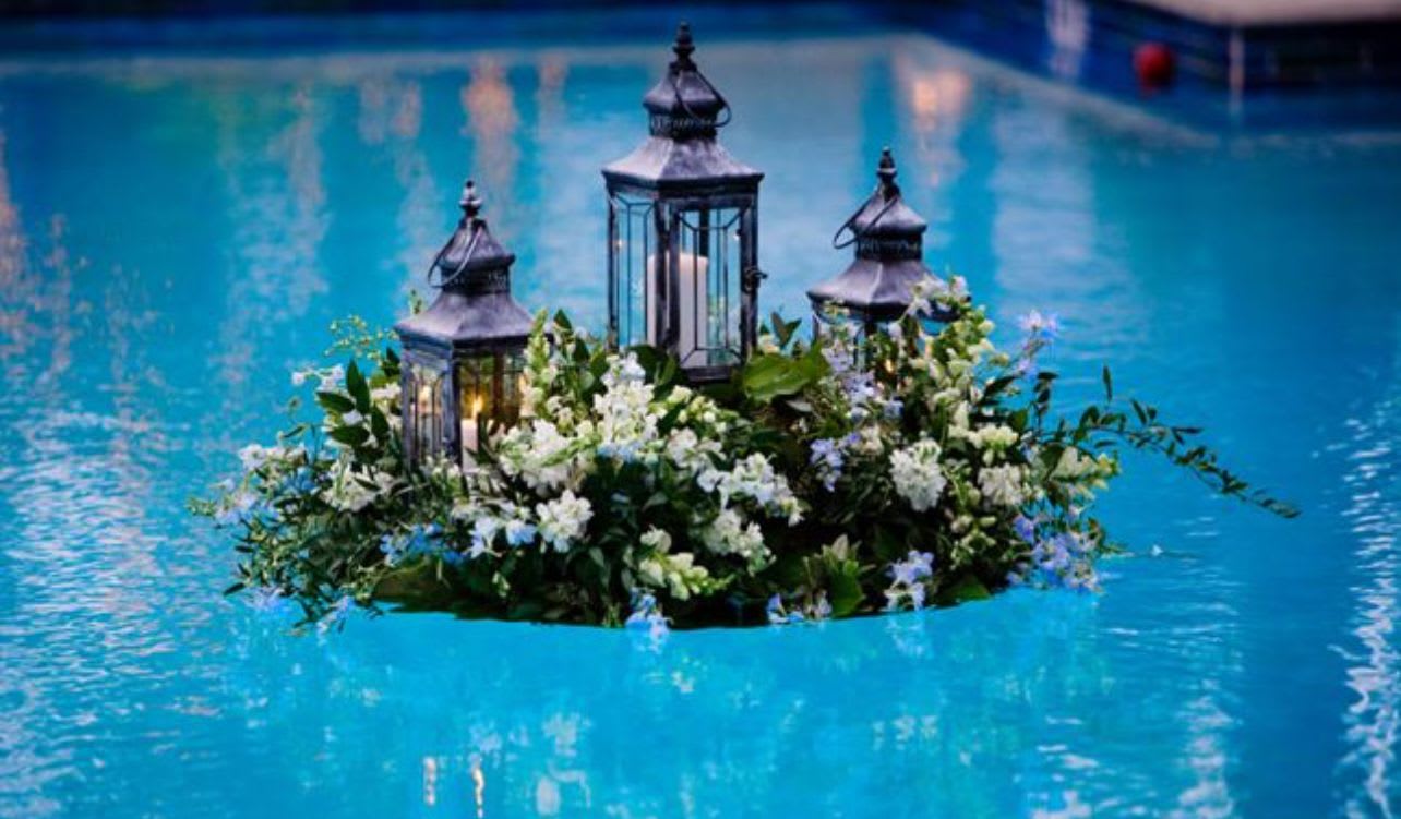 One floating arrangements for your pool or pond - These arrangements are fun to display floating in your backyard, pool or pond For your guestFor your guests to marvel at   We handcraft these arrangements in your preferred color,  palette  At  the end of checkout for notes for the florist Please put in your wish list for your preferred flower list 5 to 10 wish flowers and Our floral experts will try our best to make you something special for your loved ones  