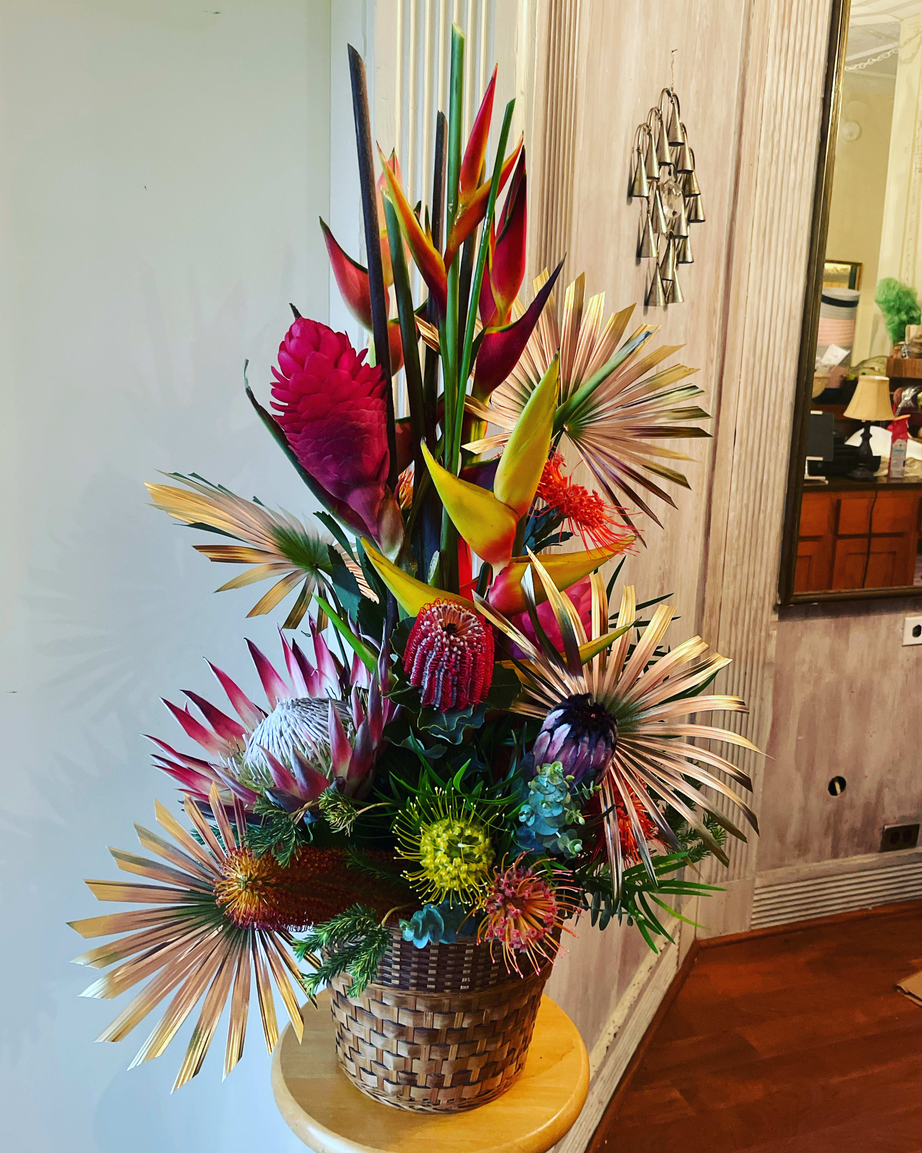 Tropic Like It’s Hot (OAHU ONLY) - Looking for a show-stopping floral arrangement that exudes the energy and vibrancy of the tropics? Look no further than "Tropic Like It's Hot" from Tropical Florals Hawaii. This bold and beautiful arrangement features only the finest locally-grown exotic blooms from the islands of Hawaii, ensuring a fresh and stunning display every time. From fiery reds and oranges to deep purples and bright yellows, "Tropic Like It's Hot" is a celebration of all the colors and flavors of the tropics. Each bloom is carefully selected for its unique beauty and personality, resulting in a fun and energetic arrangement that is sure to turn heads and make a statement. Whether you're looking to add a touch of the islands to your home or office, or you want to surprise someone special with a truly unforgettable gift, "Tropic Like It's Hot" is the perfect choice. So go ahead and let your inner island spirit shine with this loud and bold floral masterpiece from Tropical Florals Hawaii.
