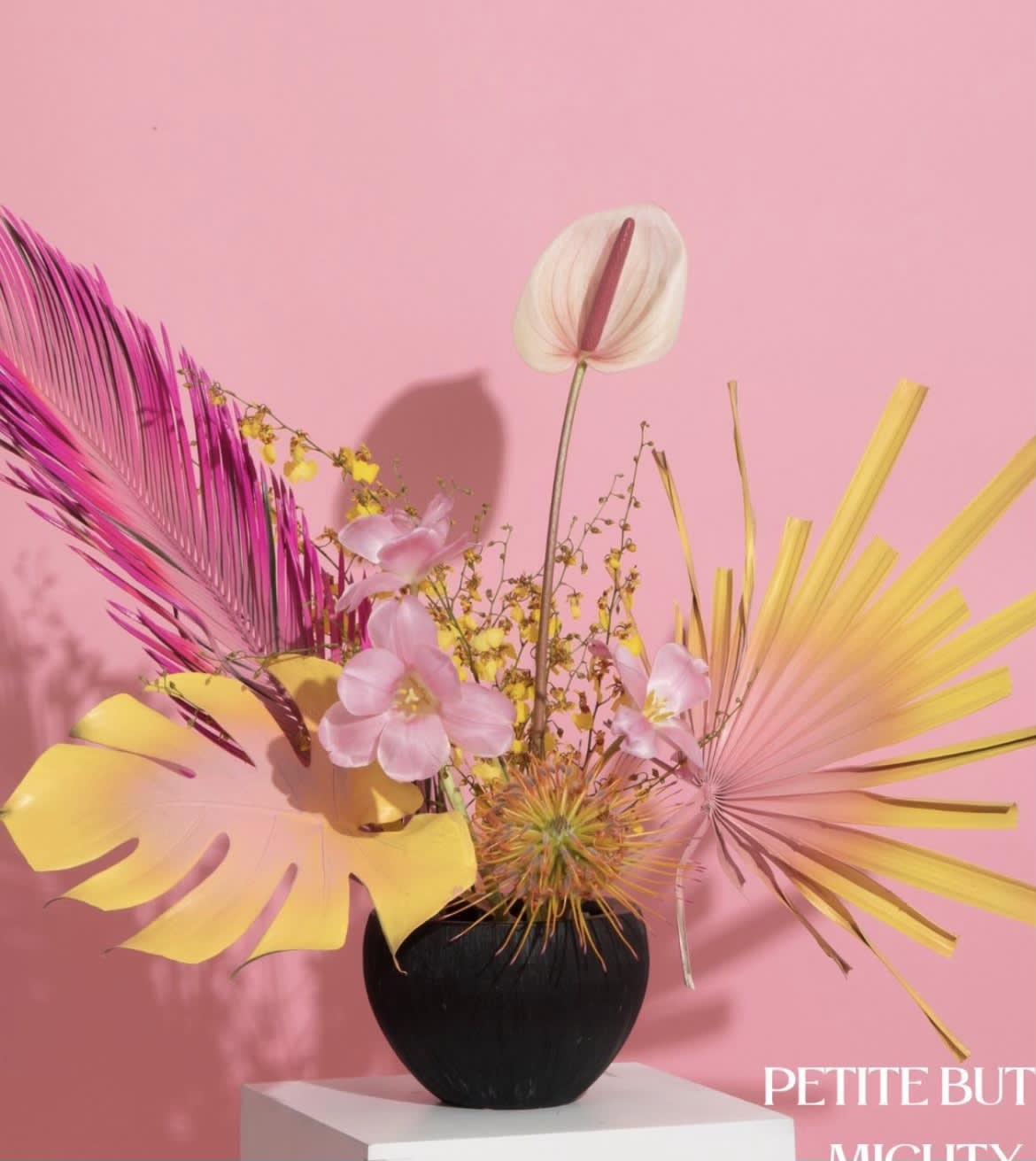 Jaw-dropping spectacular mix of exotic blooms - This design is a Zen whimsical arrangement with airbrush tropical greens  This will stop anybody in their tracks to admire the beautiful blooms &amp; captures the imagination to anyone that lays their eyes upon this beautiful jewel 