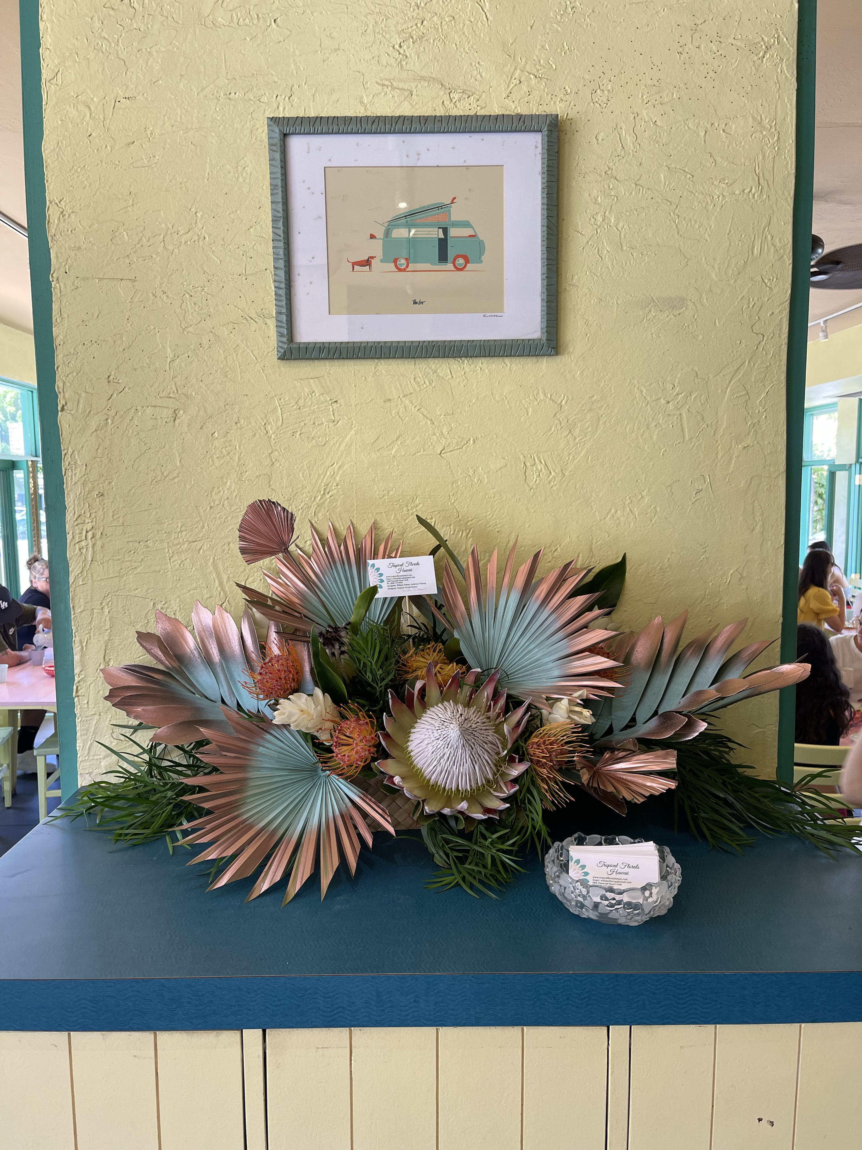 designers choice Low and compact centerpiece arrangement with rose gold accentaccents   - Is is low and compact centerpiece is perfect for a dining room table for your party or dinner display packed with exotic blooms fresh from the farm 