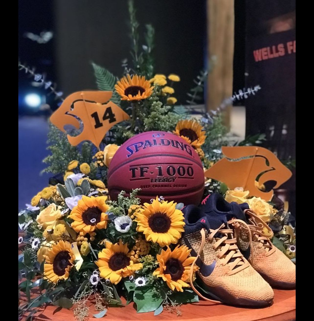 Basketball sunsation  - This mixed yellow color palette also can be in any mixed array of colors in your preferred color palette just let me know in the comments below for the special instructions or notes for the florist at the end of checkout  Basketballs are only provided by the client. I do not purchase the basketballs. It’s whatever you bring me or I can come to your house and do a quick installation. Basketballs and sports equipment and shoes are not included in this arrangement. Please provide me with the items that you would like me to showcase inside of any arrangement.  When you proceeded to check out, please choose any of the arrange of prices every upgrade chosen we provide more exotic and expensive flowers and add more orchids and greens for a bigger and fuller look upgrade is generously packed with our tropical blooms and gets bigger and better with every upgrade