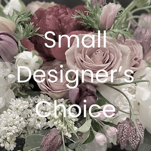 Blush and burgundy floral bouquet with white blooms and greenery