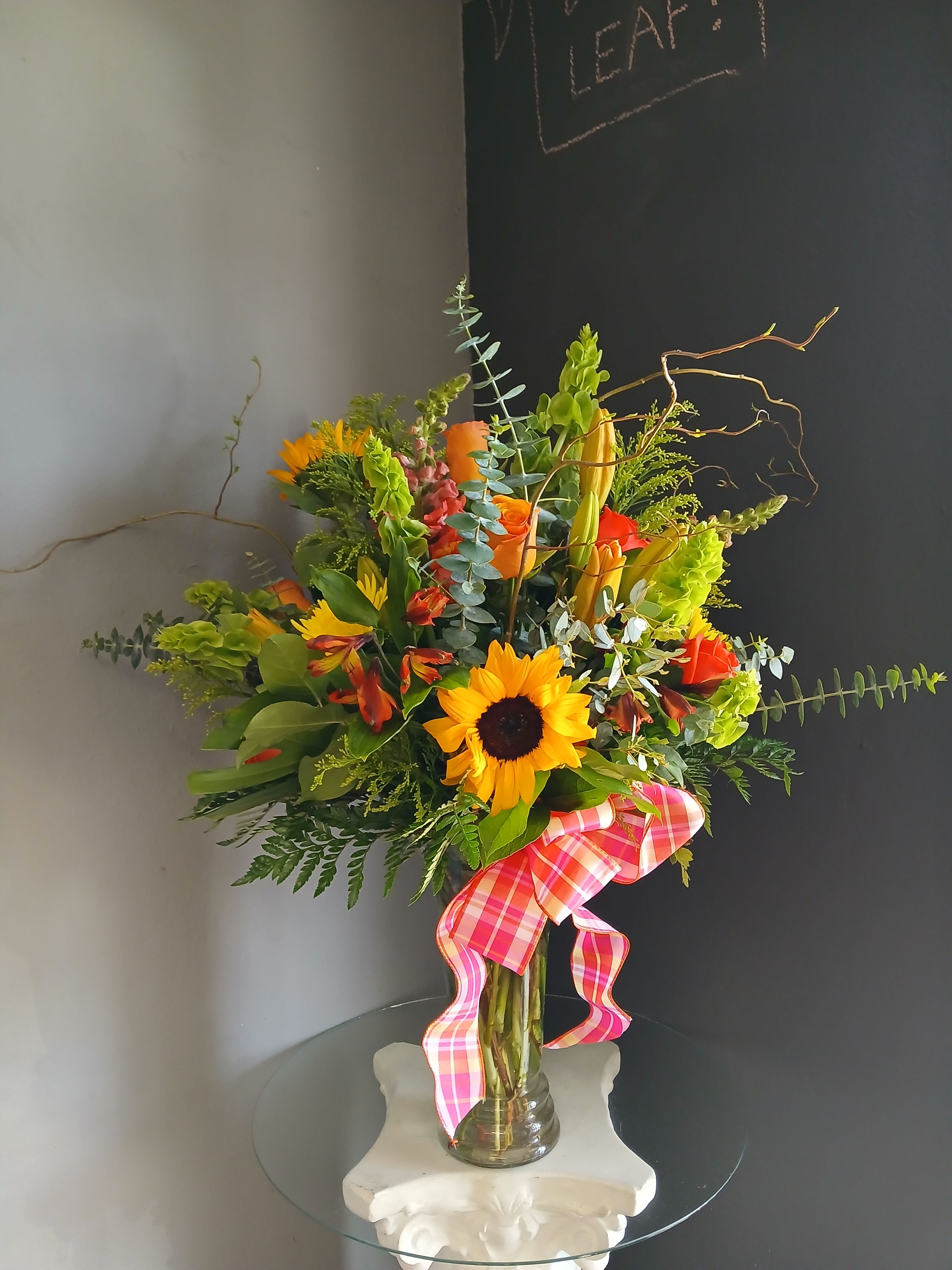 #733 Designer's Choice Vase Arrangement - This beautiful flower arrangement of fresh mixed seasonal blooms is made by local designers in the heart of Orange California. Hand crafted and perfect for every occasion, from birthdays and new babies to sympathy and just because. The best choice to show you are thinking of that special someone. Can be sent as a local delivery or in-store pickup. This is an original, one of a kind arrangement. Order now before it's too late!  UPGRADES: All upgrades are applied at the designer’s discretion and fulfilled to value using the freshest seasonal and/or premium flowers available. Container upgrades may be included when possible; otherwise, value is reflected in the floral selection while maintaining the original design style. 