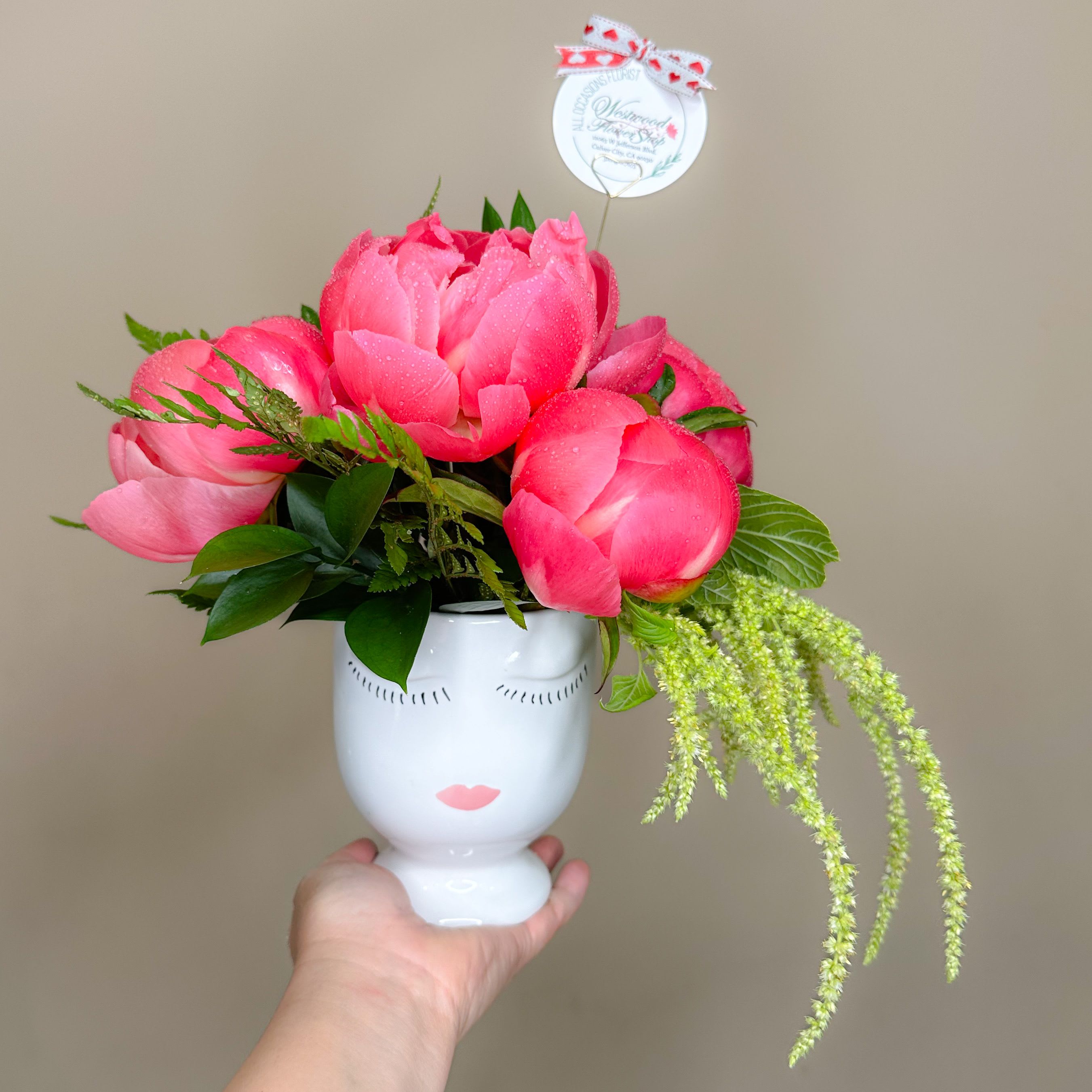 Peony Selfie - Poenies are in season!!! Order this lovely bouquet of all peonies arranged in a keepsake selfie vase! Perfect gift for all occasions! Same day delivery available!  Approximately 10" H x 8" W   ***Please note that our peonies come in different shades of pinks! Some come darker in fuschia, lighter as shown and peach/coral tones. There may be substitutions depending on availability but we guarantee they are as fresh and beautiful and of premium quality as always! 