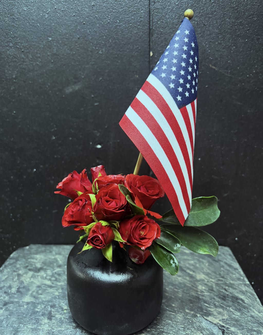 Little Liberty - Spray roses, flag, stylish Gio vase. Very petite arrangement approximately 5 inches tall, reusable vase. 