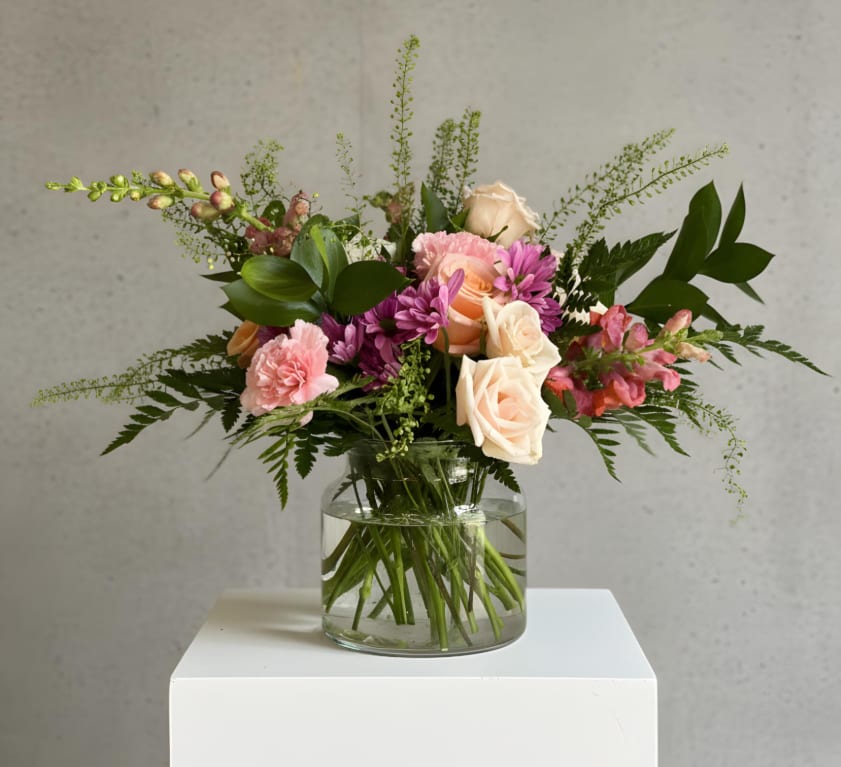 Blushing Meadow - Soft blush roses, playful pink blooms, and lush greenery come together in this effortlessly romantic arrangement designed to feel fresh, feminine, and garden inspired. Perfect for birthdays, celebrations, or simply making someone’s day brighter.
