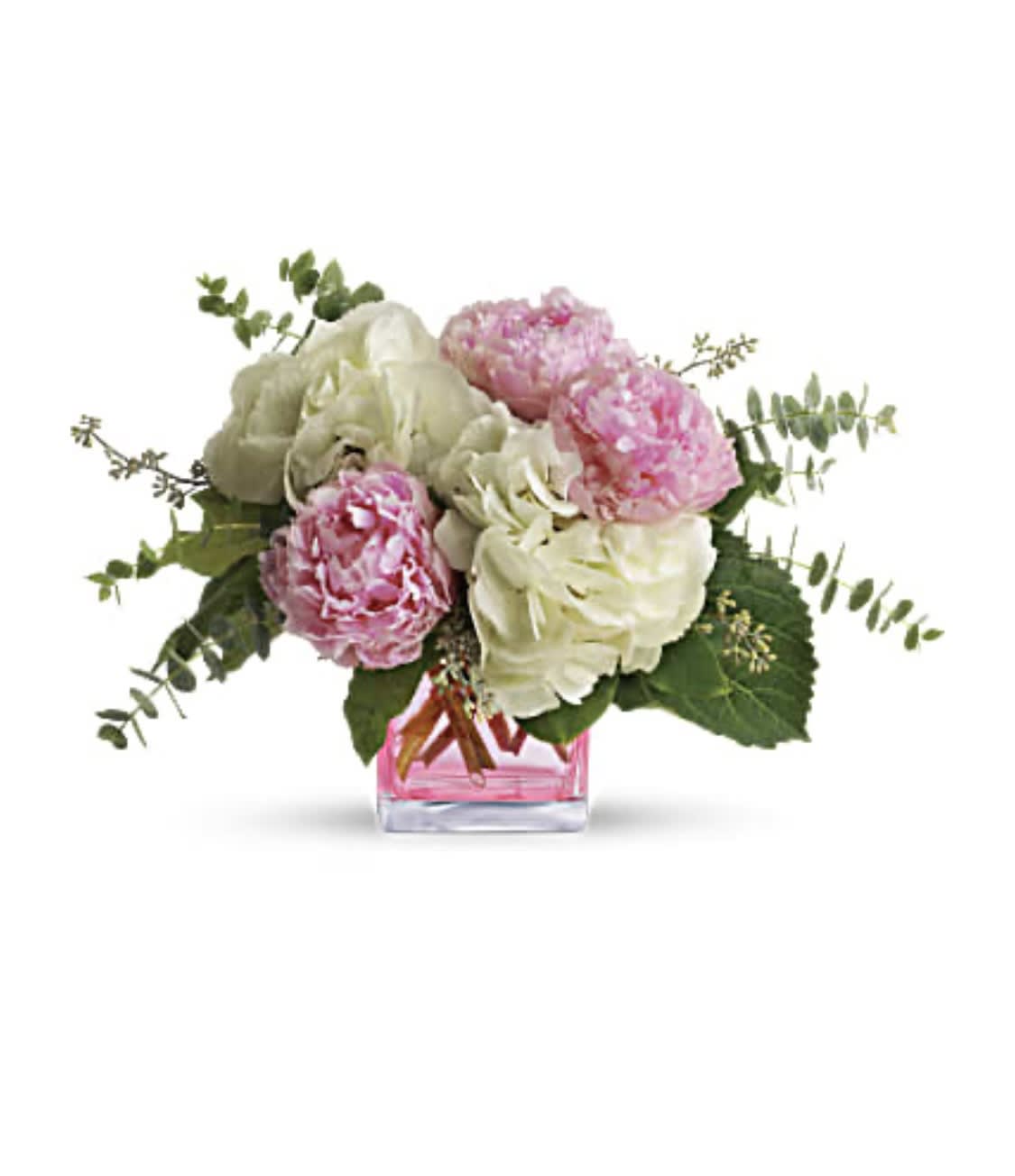 Pink and white peonies in a pink glass vase
