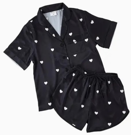 Satin Two-Piece PJ Set - Large - You never know who you'll meet in your dreams! This luxurious silky satin set by Bella Sleep + Spa is perfect for girls' nights and slumber parties. Elastic waistband and button-down shirt make this set extremely comfortable to sleep in.  • Material: 100% Satin Polyester • Care Instructions: Machine Wash Cold. Lay Flat To Dry