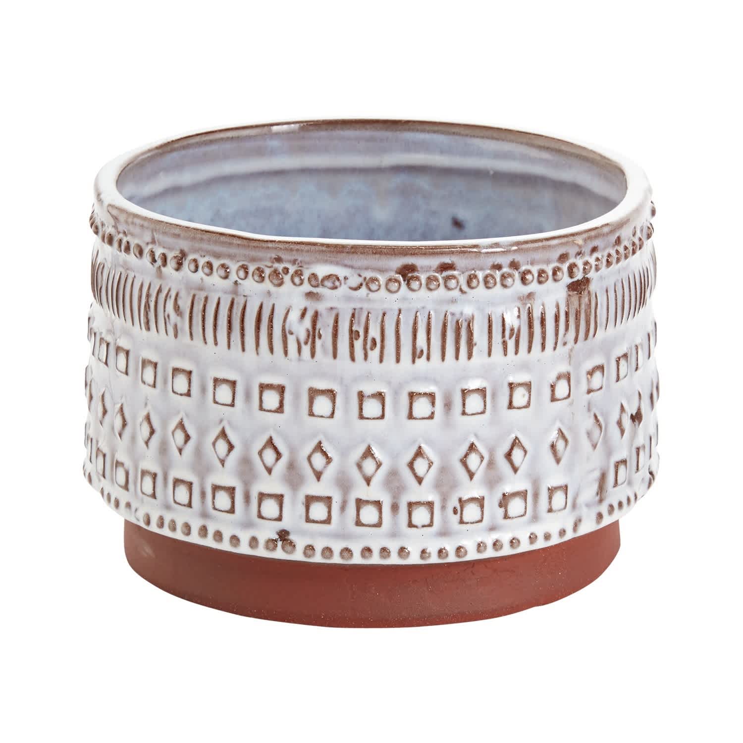 Decorative ceramic planter with a white patterned glaze and brown base