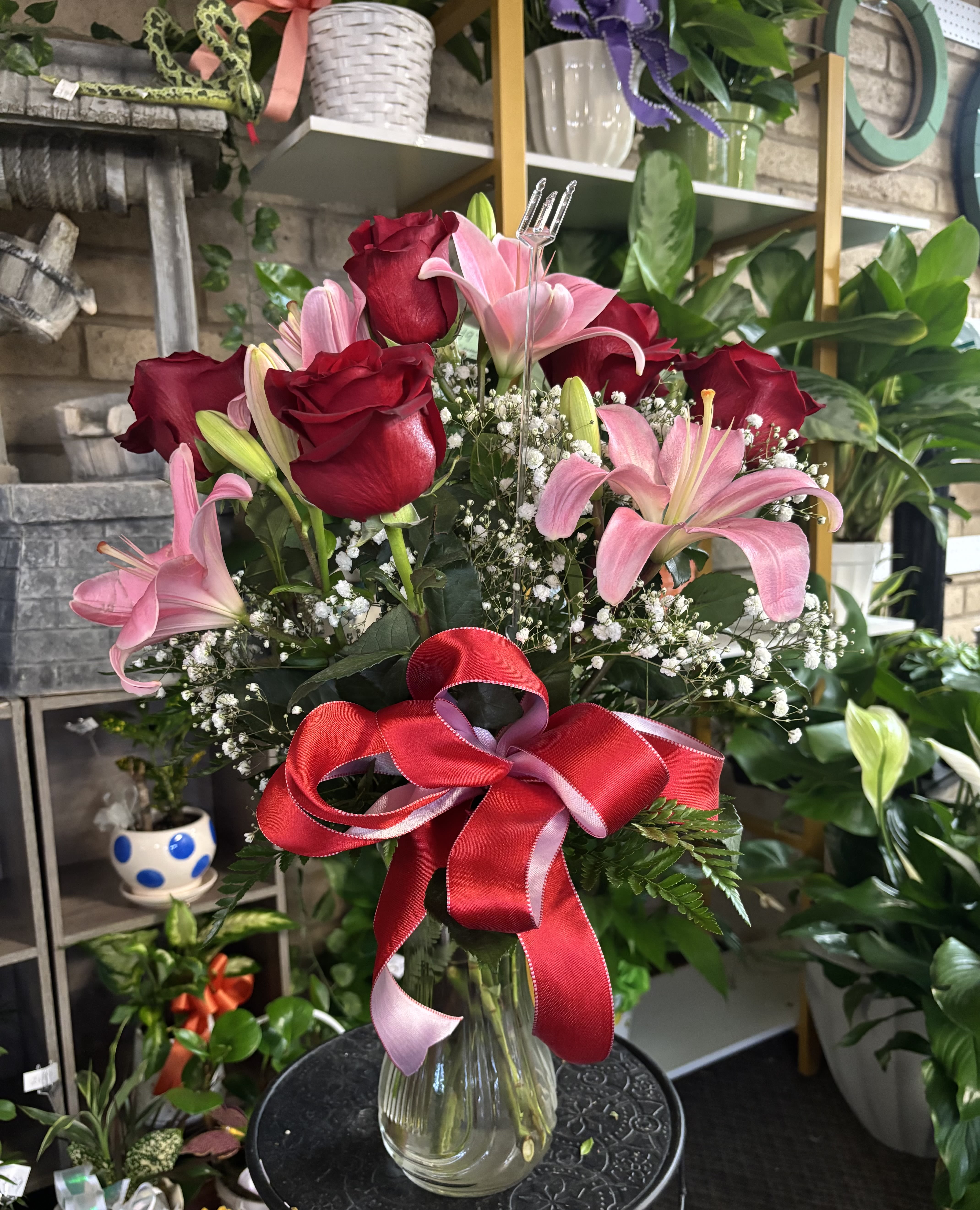 Pink/Red Floral - Reasonable flower substitutions may be made due to availability