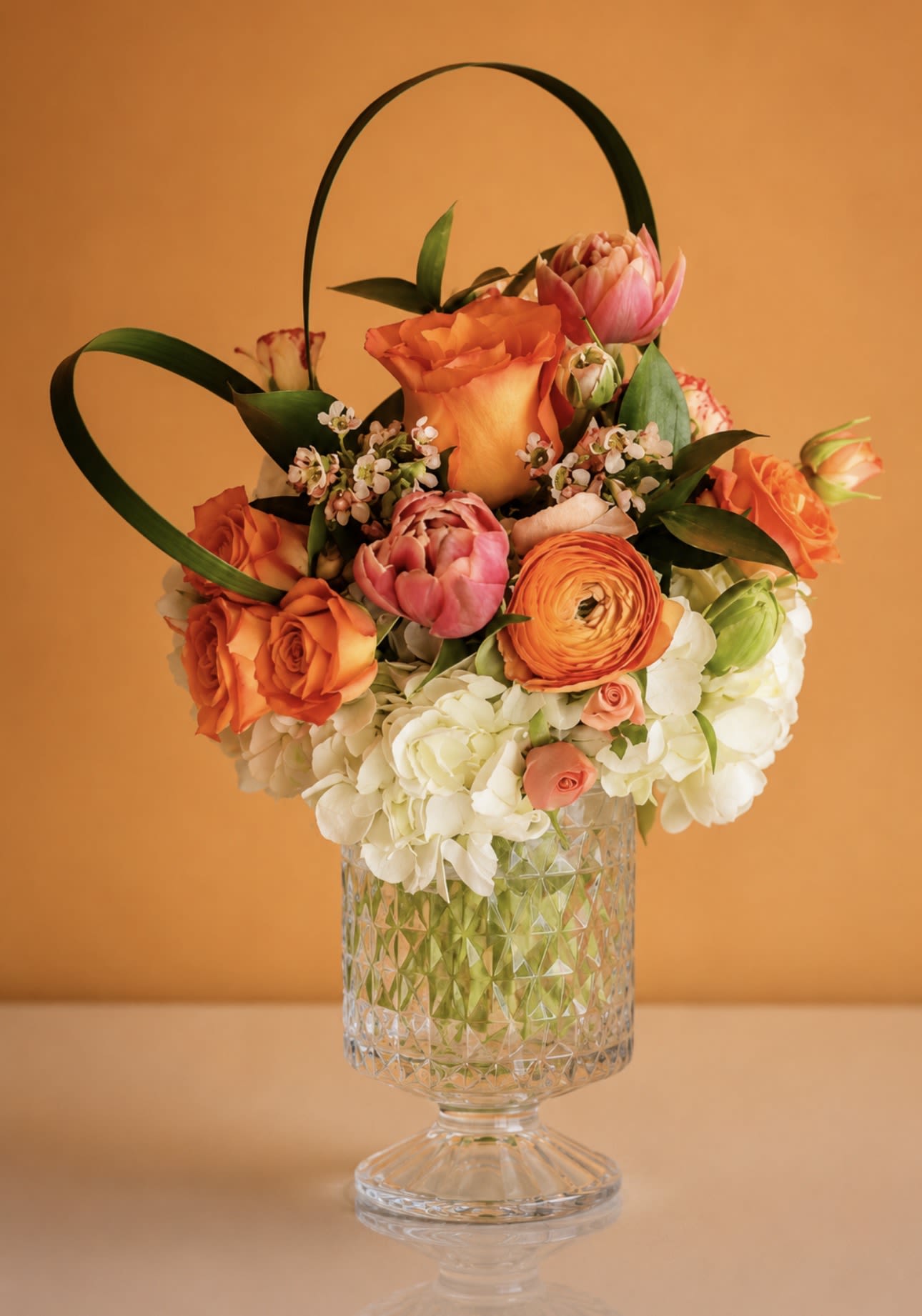 Sweet Mama! - Standard - Peach - Celebrate warmth and grace with Sweet Mama - a gorgeous mix of peach and orange roses, lush ranunculus, and hand-picked seasonal accents. Each arrangement will be crafted with love and care to be as close to the photo as possible.