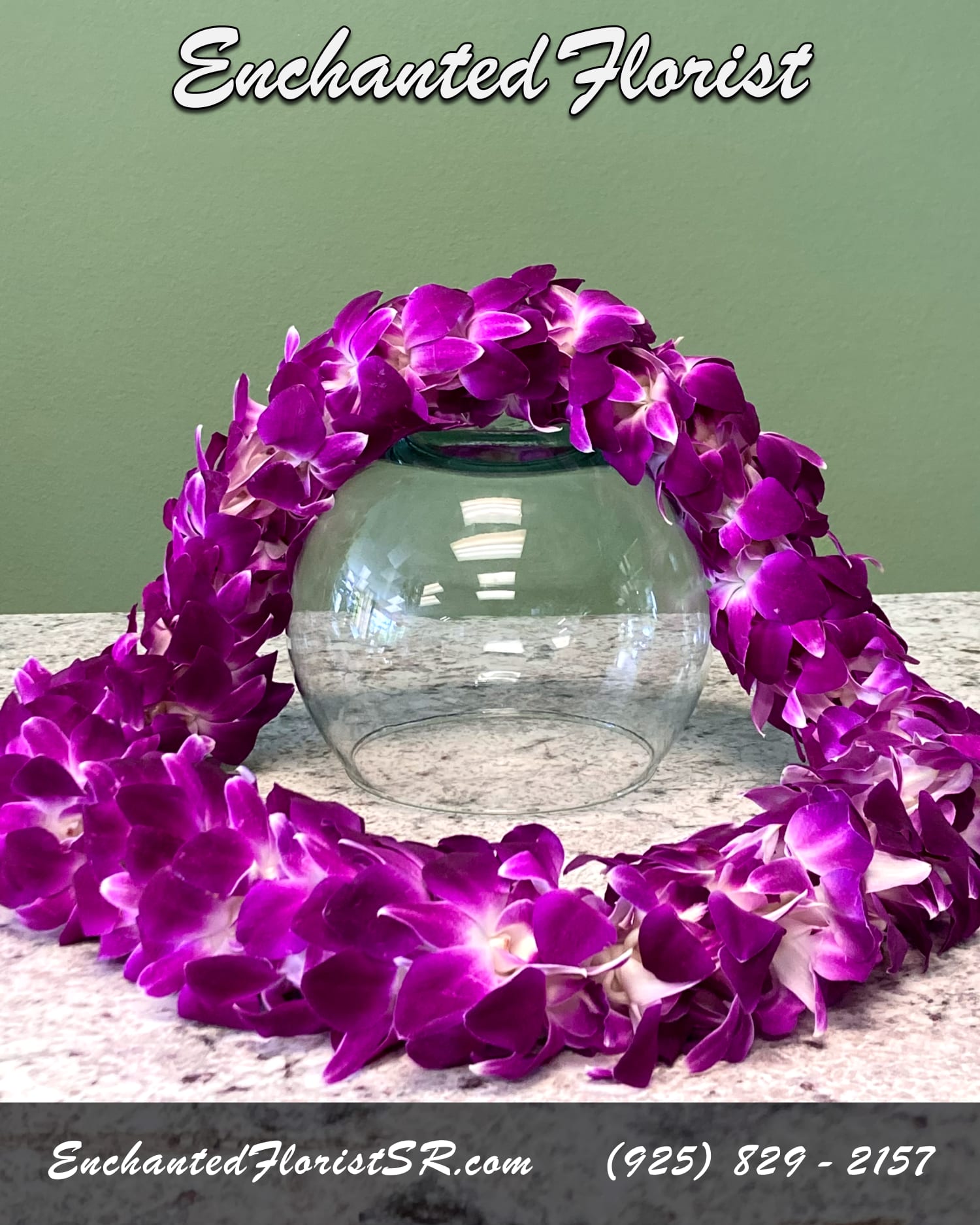 Purple orchid lei draped around a clear glass bowl