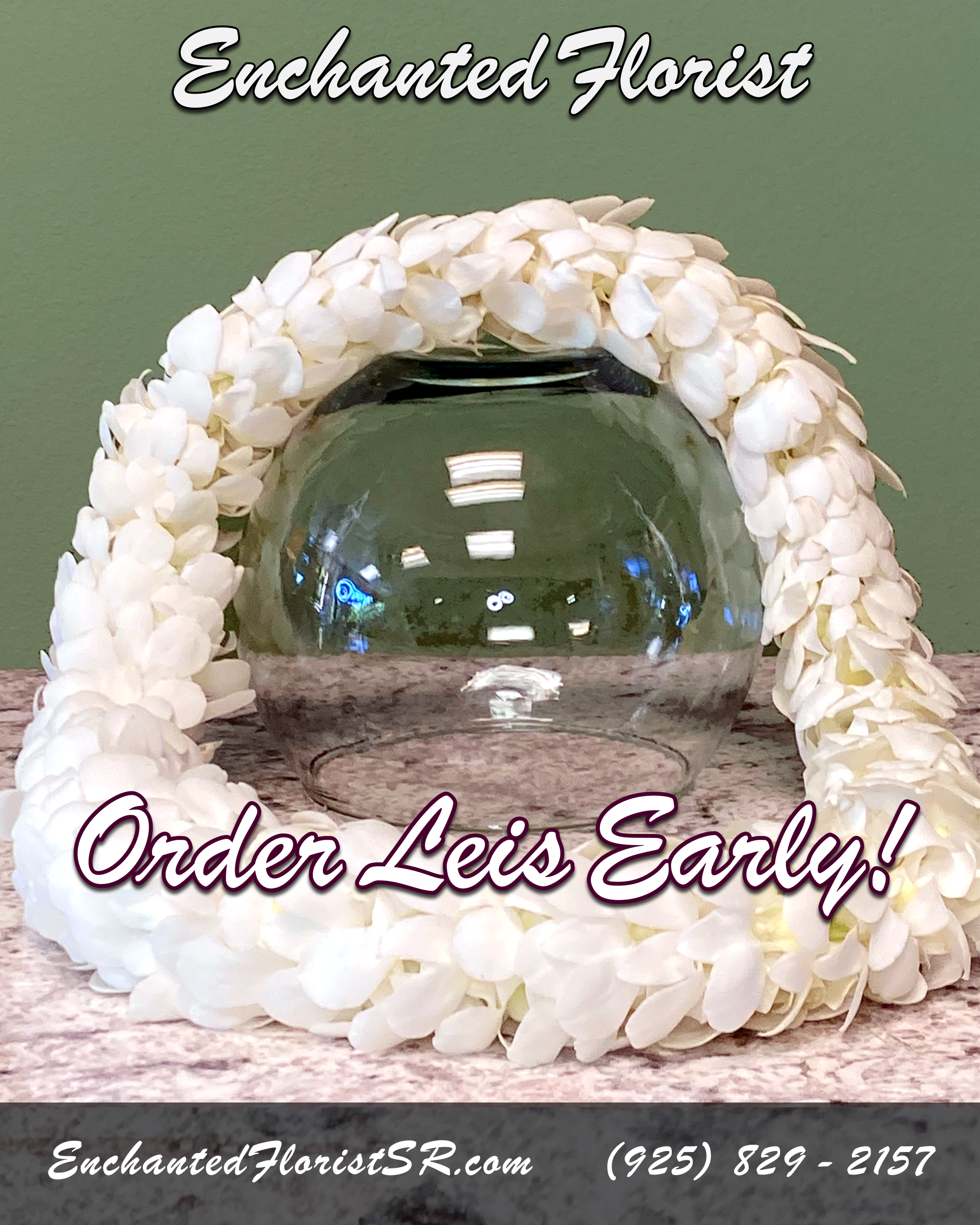 White floral garland draped around a clear glass bowl on a tabletop