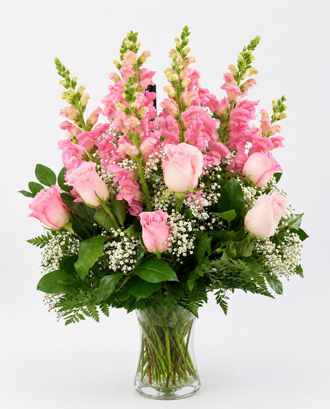     Blushing Beauty  -     Soft pink roses and graceful snapdragons create a romantic and feminine arrangement full of charm and elegance. Perfect for birthdays, anniversaries, new babies, or simply making someone feel loved and appreciated.