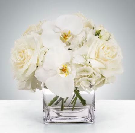 Linen Flower -  Pet Friendly? NO Roses are generally considered low-risk, but mixed greenery is not fully specified.  Keep out of reach of household pets; avoid placement where curious cats may chew stems.   Human Allergy Note : No major allergy-triggering flowers noted.   Care &amp; Longevity : Trim stems at an angle upon arrival. Keep the vase clean and filled with fresh water. Change water every 1–2 days, and place away from direct sunlight, heat, or vents. Remove fading blooms promptly to extend overall freshness.   Best Occasions &amp; Situations : - Birthday (elegant, neutral taste) - Anniversary (subtle romance) - Congratulations - Get well or comfort - Housewarming - Thank you - Office or professional gifting   Why Customers Love It : - Soft, neutral color palette that fits any space - Balanced height and shape - Gift-ready presentation - Easy to style at home or work - Feels calm, refined, and intentional