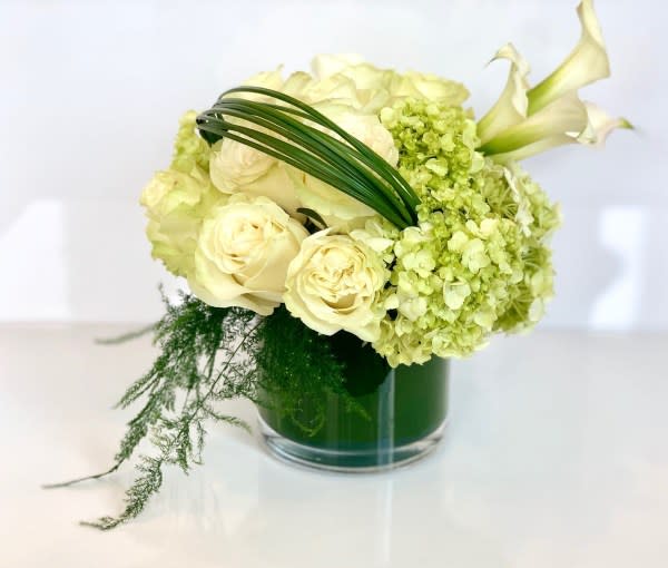 CHLOE ™ - Beautiful floral arrangement in a 6″ round glass vase.  D-Or,  Enjoy the Beauty of Nature!