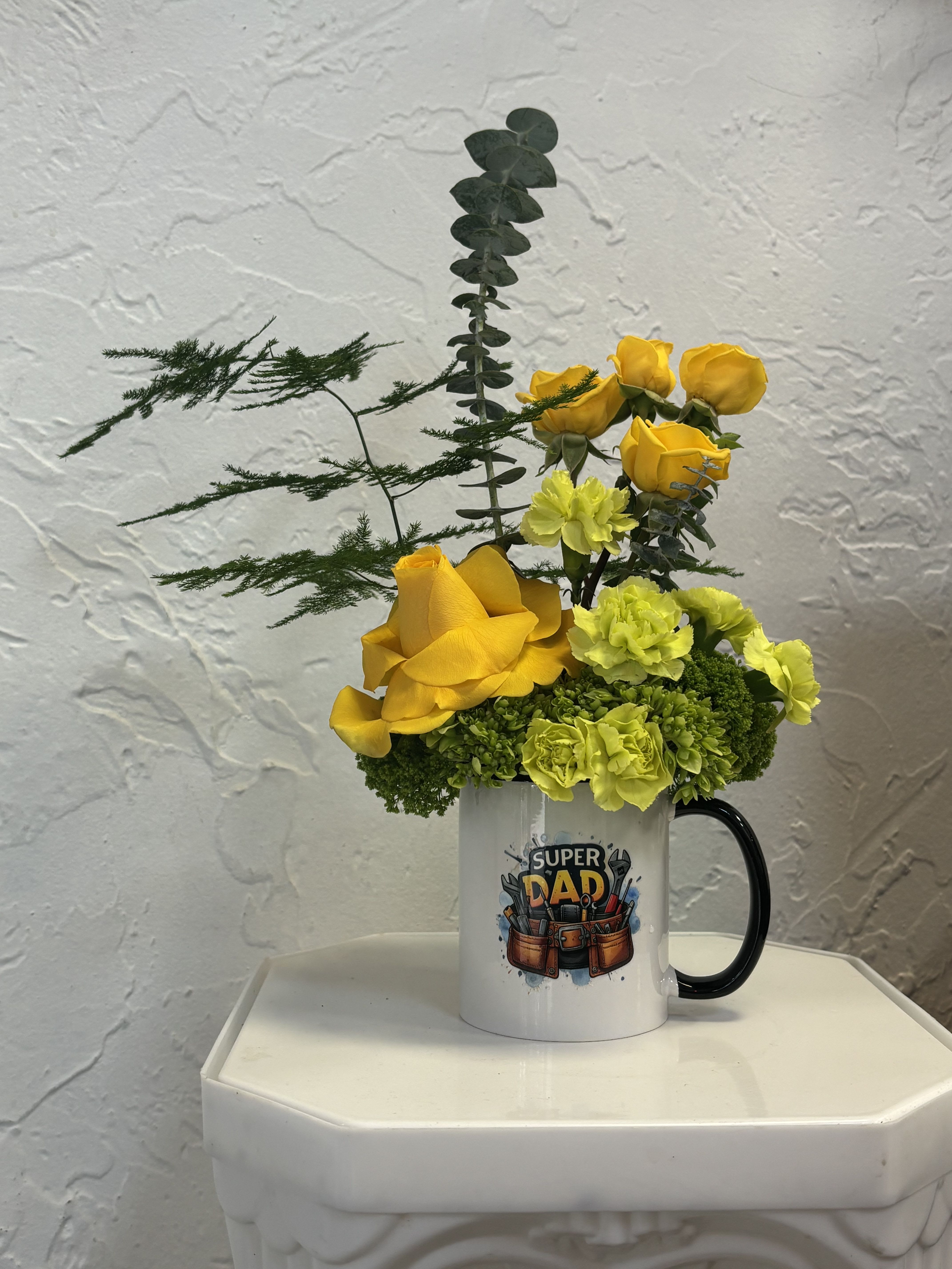 Gone Fishing - Send Dad on a Gone Fishing adventure. Yellow Roses and various greens come together to create a flowing, fun naturescape to please the eye of any Dad in his fishing cabin or on his fishing trip. 