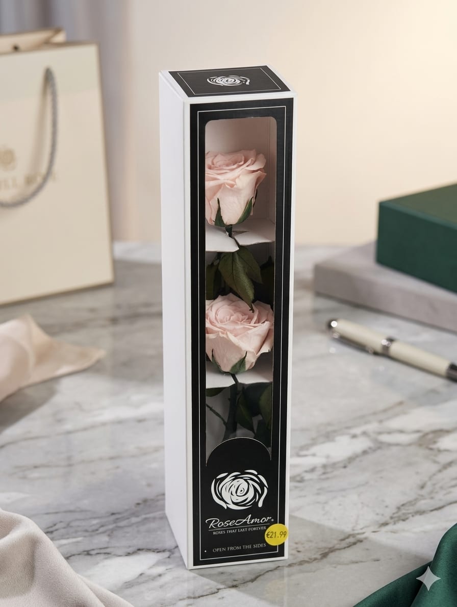 Pink Double Stem Preseved Forever Rose - Enjoy the timeless beauty of these real, full-sized pink preserved roses to last for years without water or sunlight. This premium bloom is captured at its peak and elegantly displayed in a long see through box. 