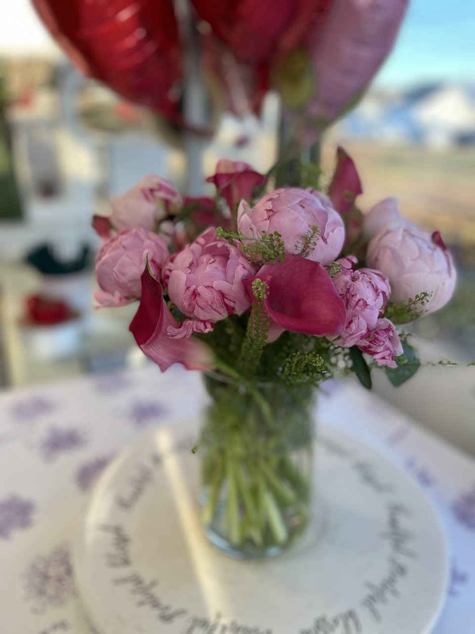 Peonies and Callas - Perfect together  - An Incredible arrangement of Pink Peonies and Pink Callas arranged in a glass Cylinder.   When only the best will do - This is the one - Standing about 15 inches tall