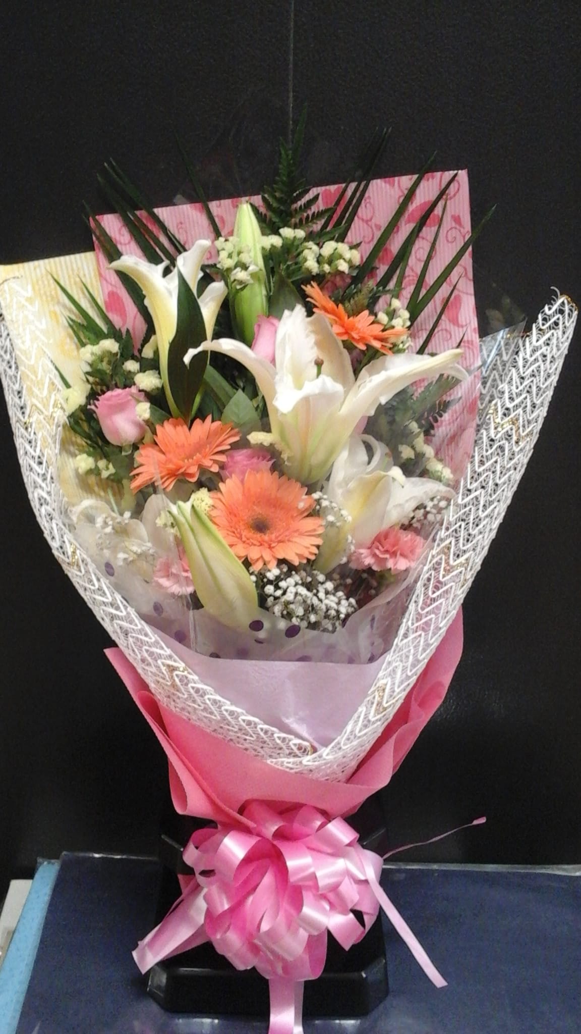 Wrapping pastel bouquet (BQ9) - Lilies and roses wrapped with art paper
