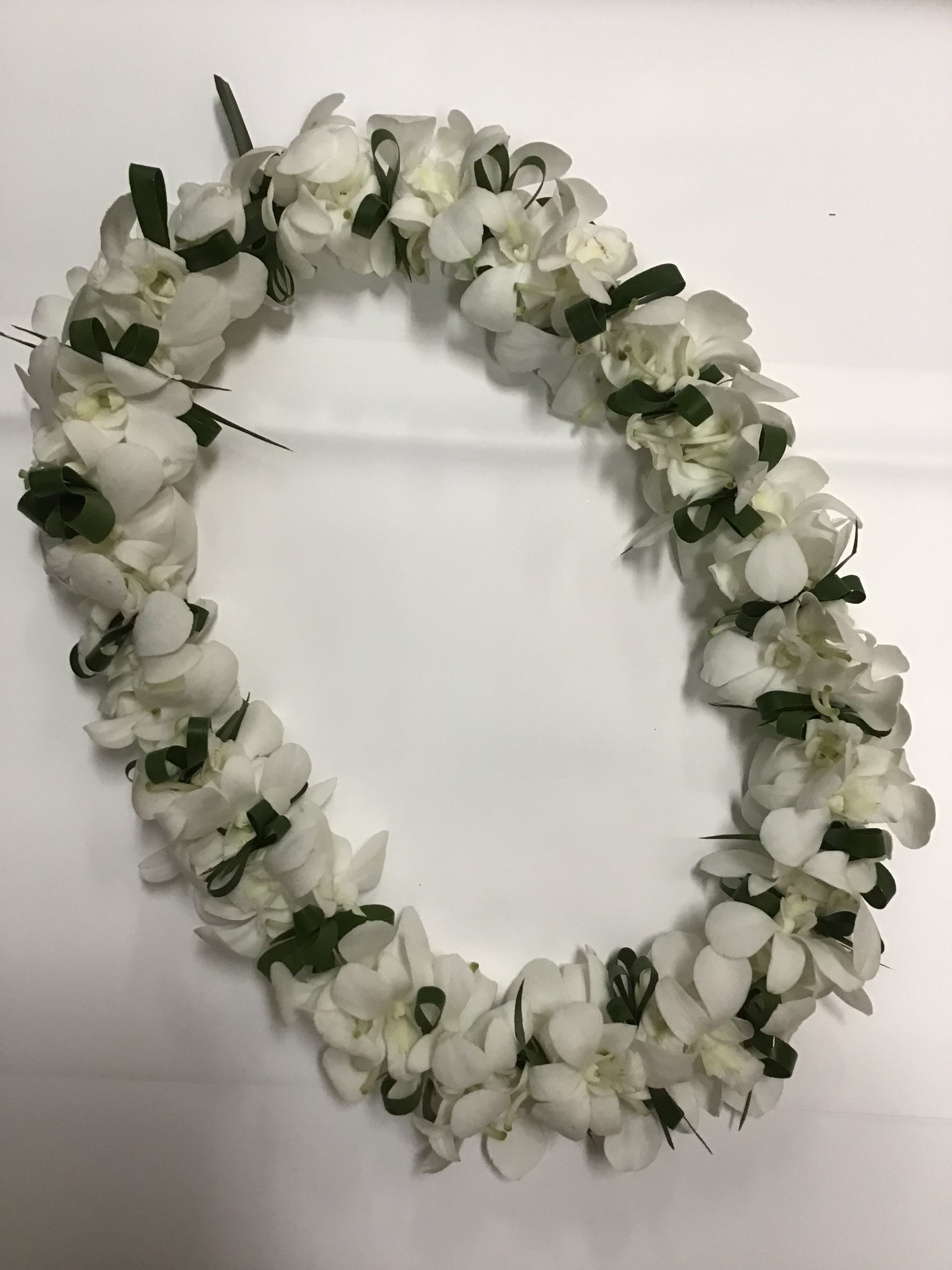 Lei 25 - White dendrobium orchid and ti leaf 