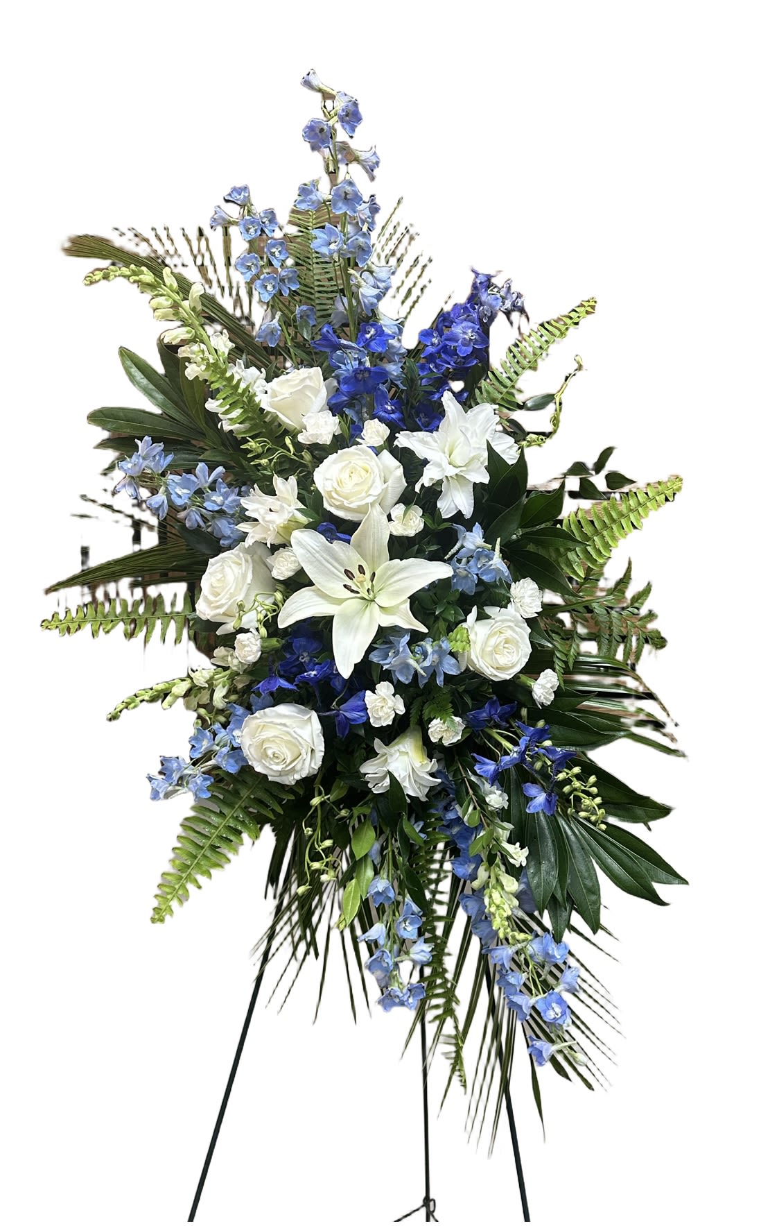Serenity Spray - Tall standing spray of white lilies and roses with blue delphinium accents 