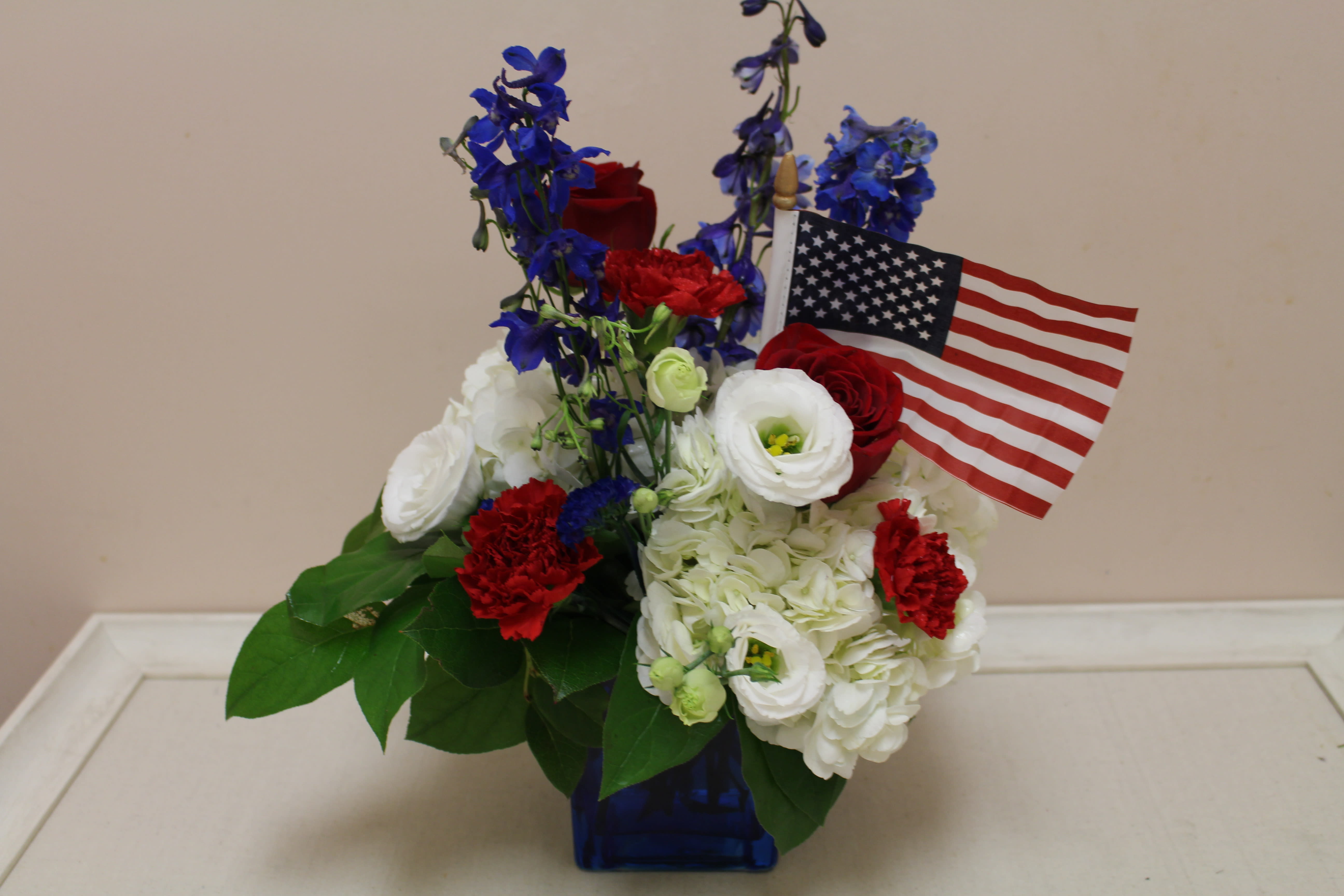 Happy 4th of July - Red white and blue.  Say "Happy 4th" with flowers 